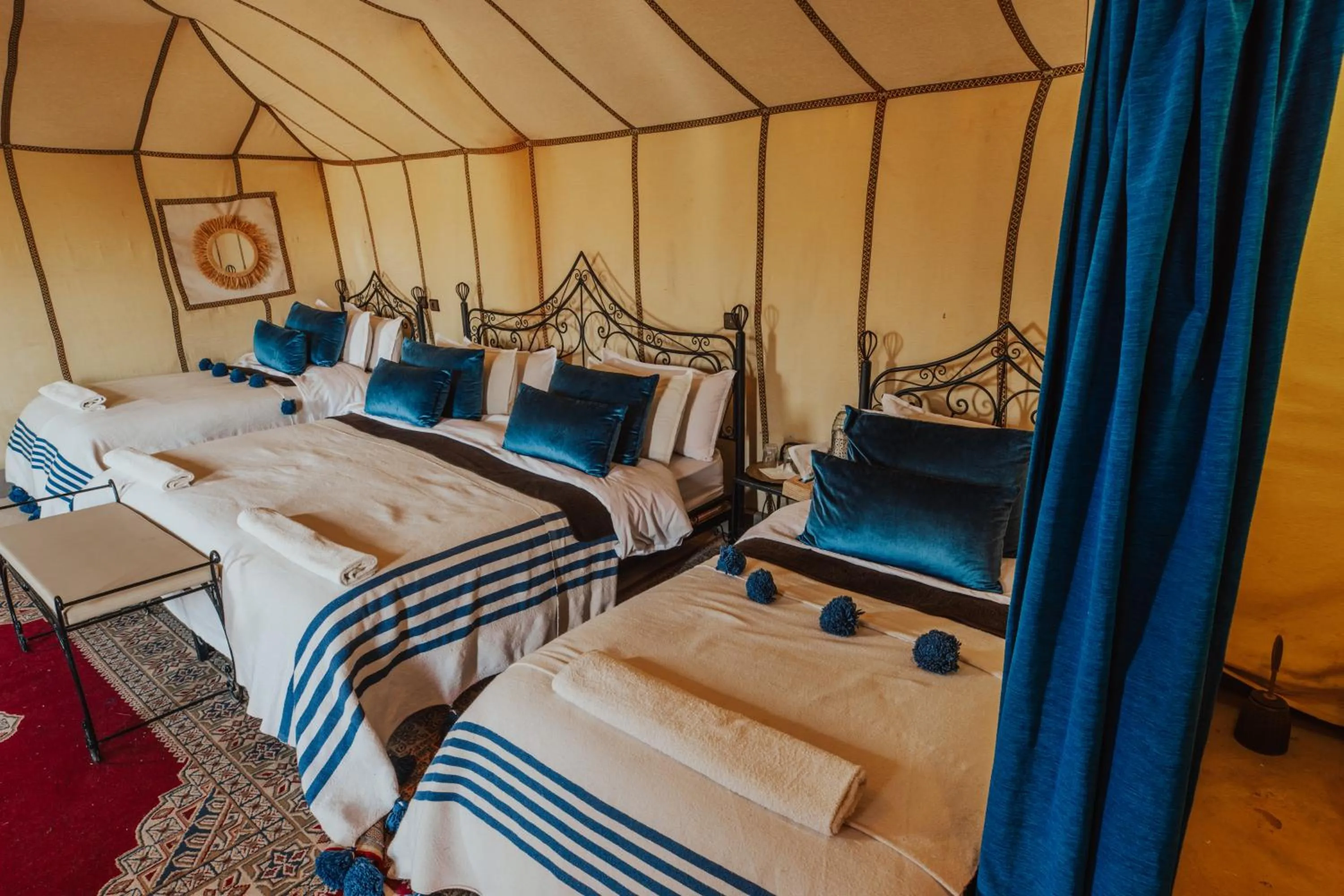 Bed in Tassili Luxury Desert Camp