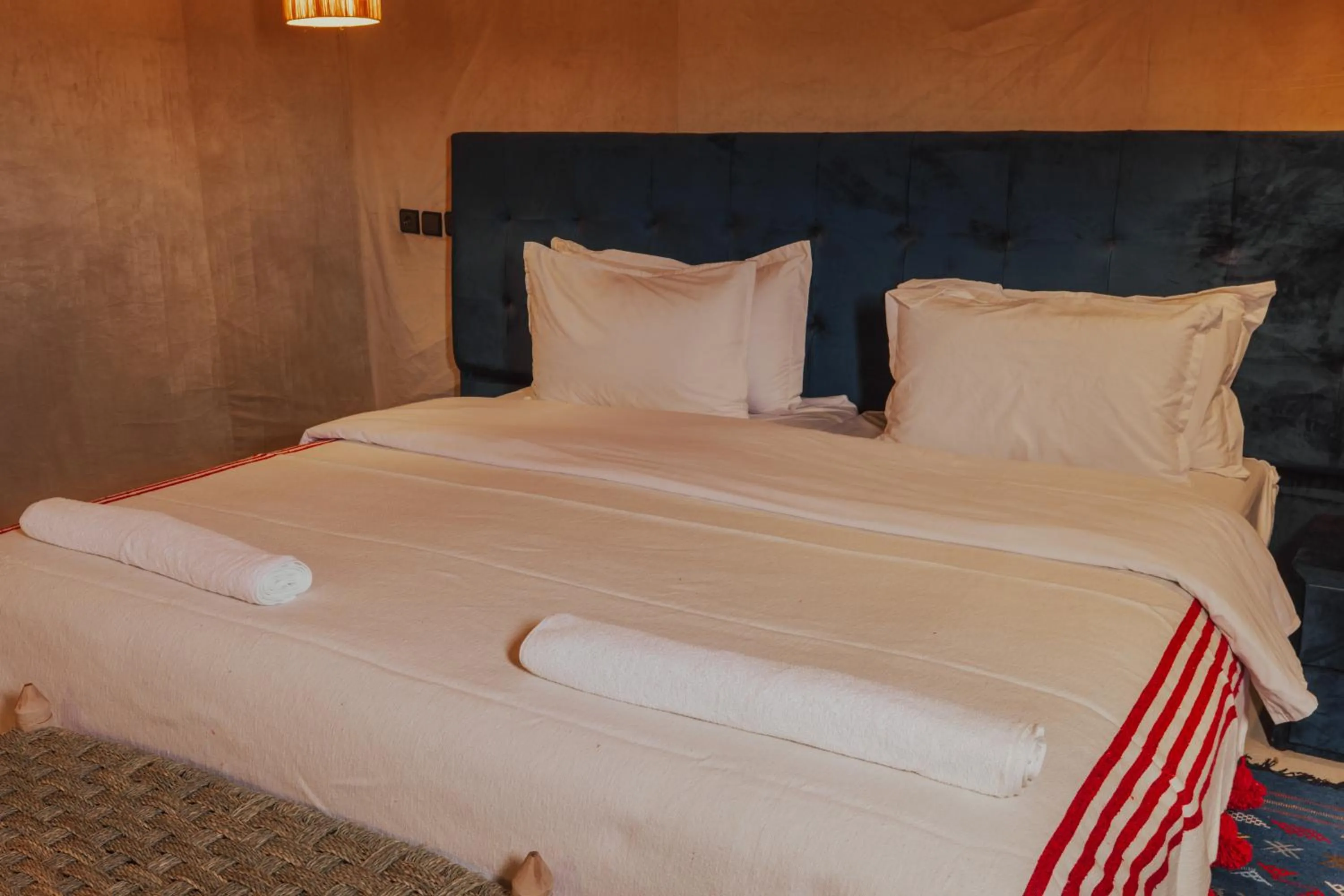 Bed in Tassili Luxury Desert Camp