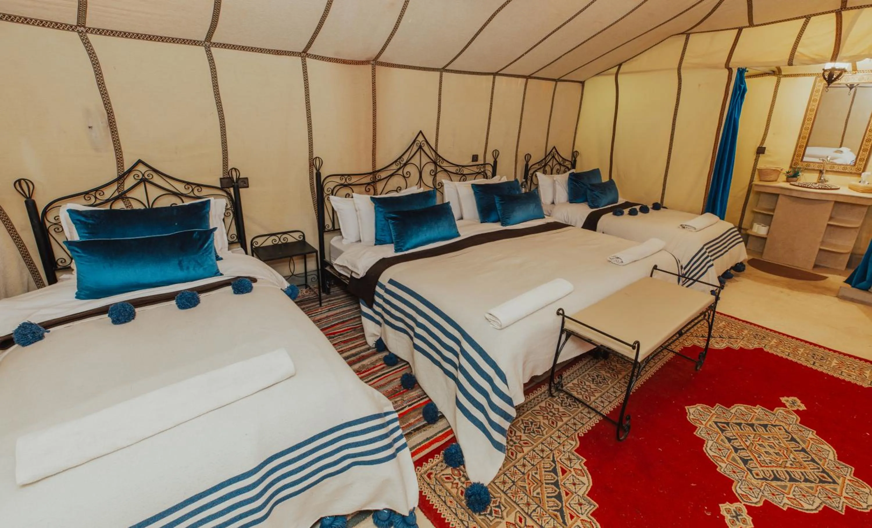 Bed in Tassili Luxury Desert Camp