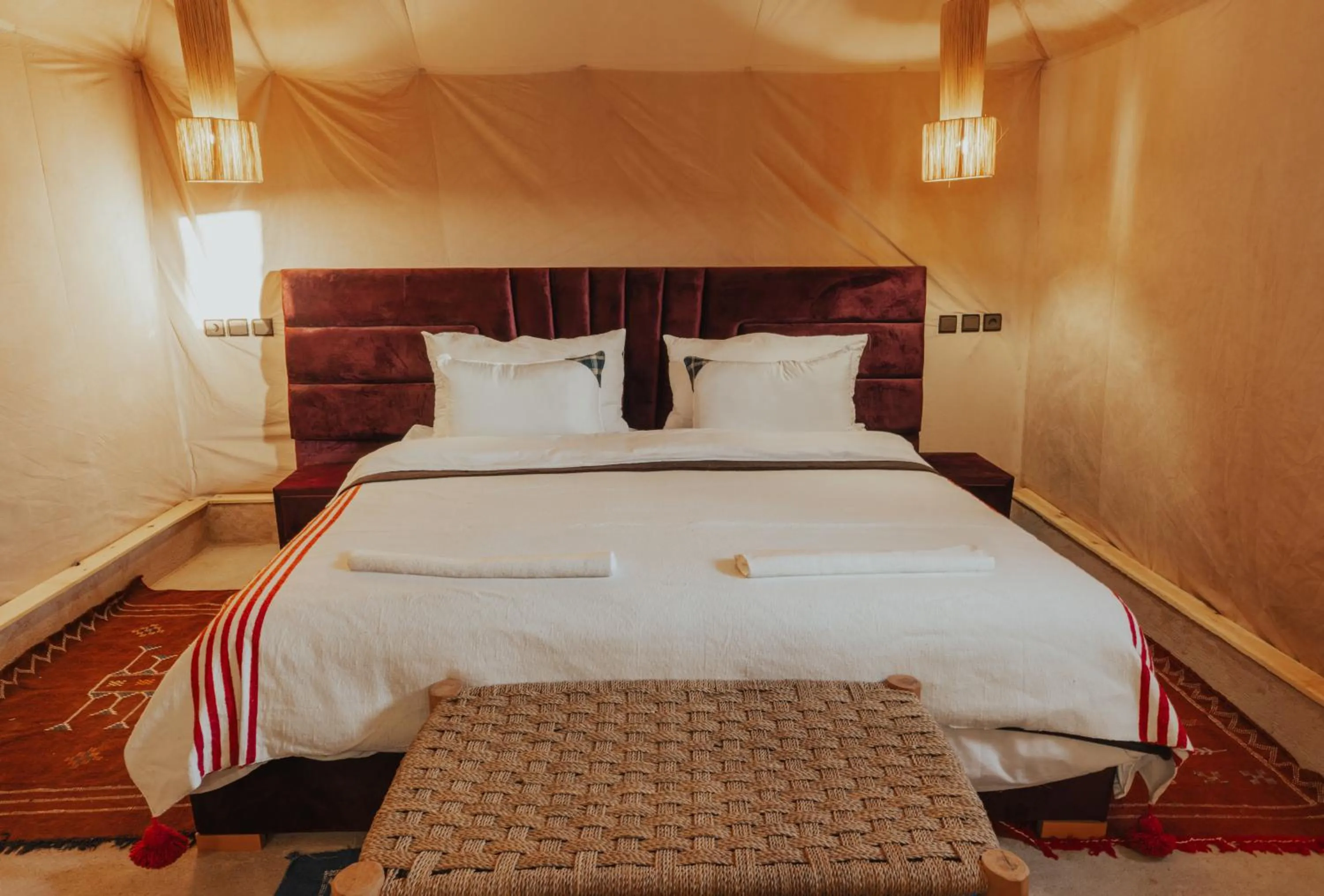 Bed in Tassili Luxury Desert Camp