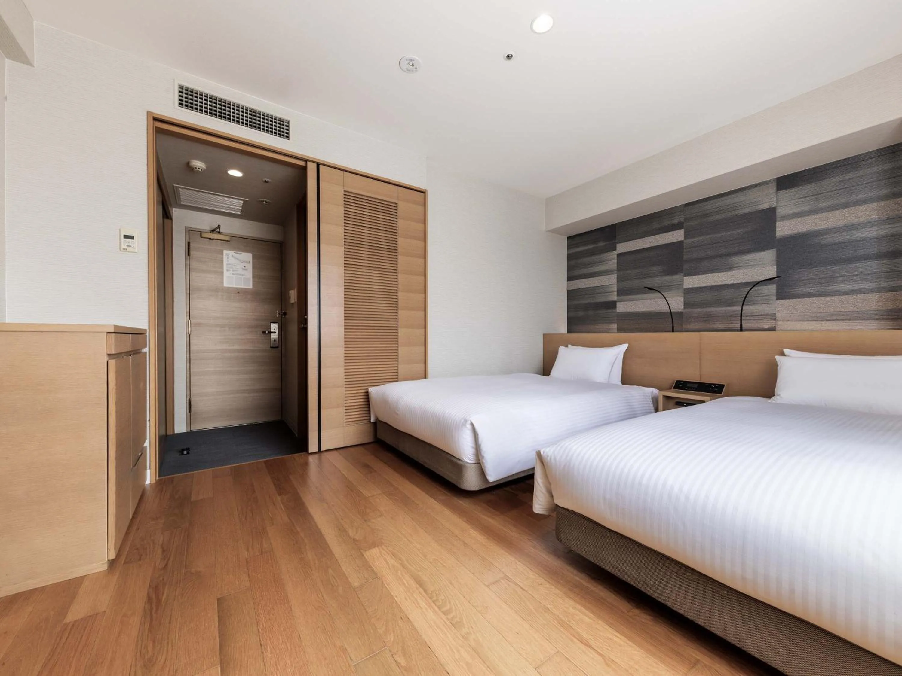 Photo of the whole room, Bed in Nishitetsu Hotel Croom Hakata