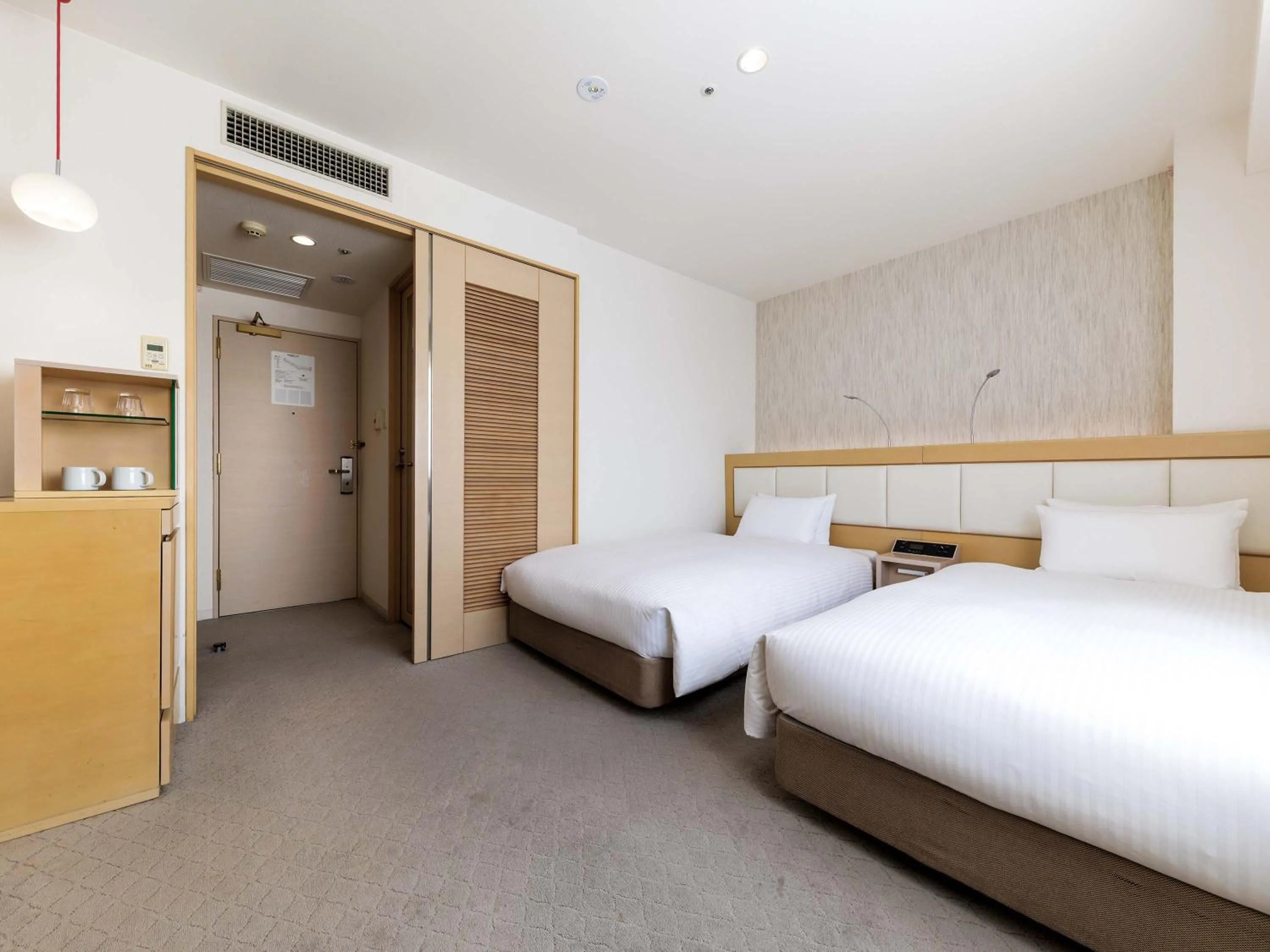 Photo of the whole room, Bed in Nishitetsu Hotel Croom Hakata