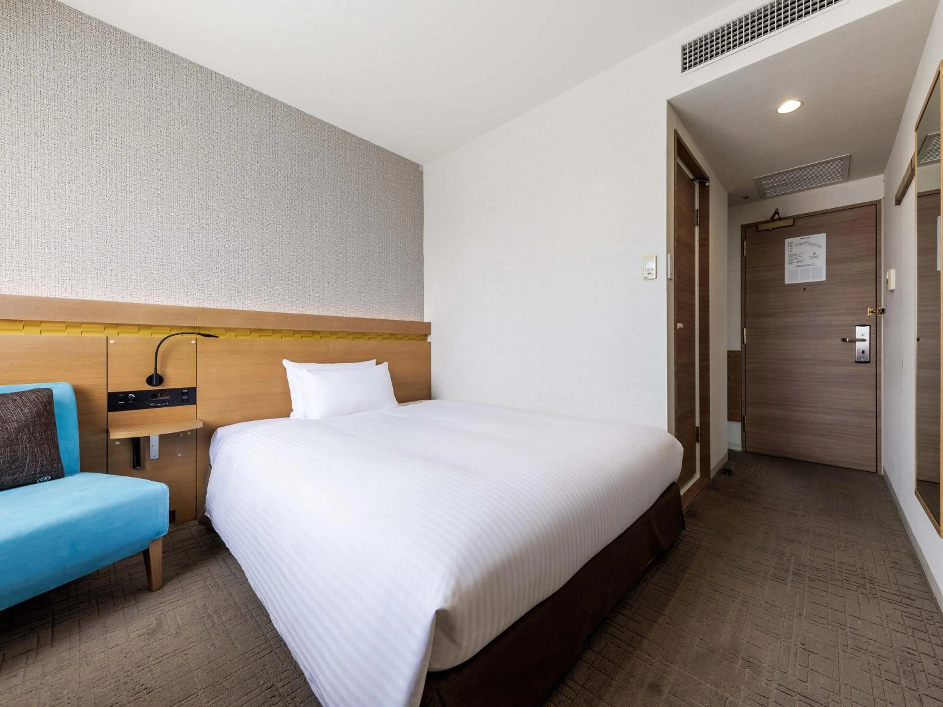 Bed in Nishitetsu Hotel Croom Hakata