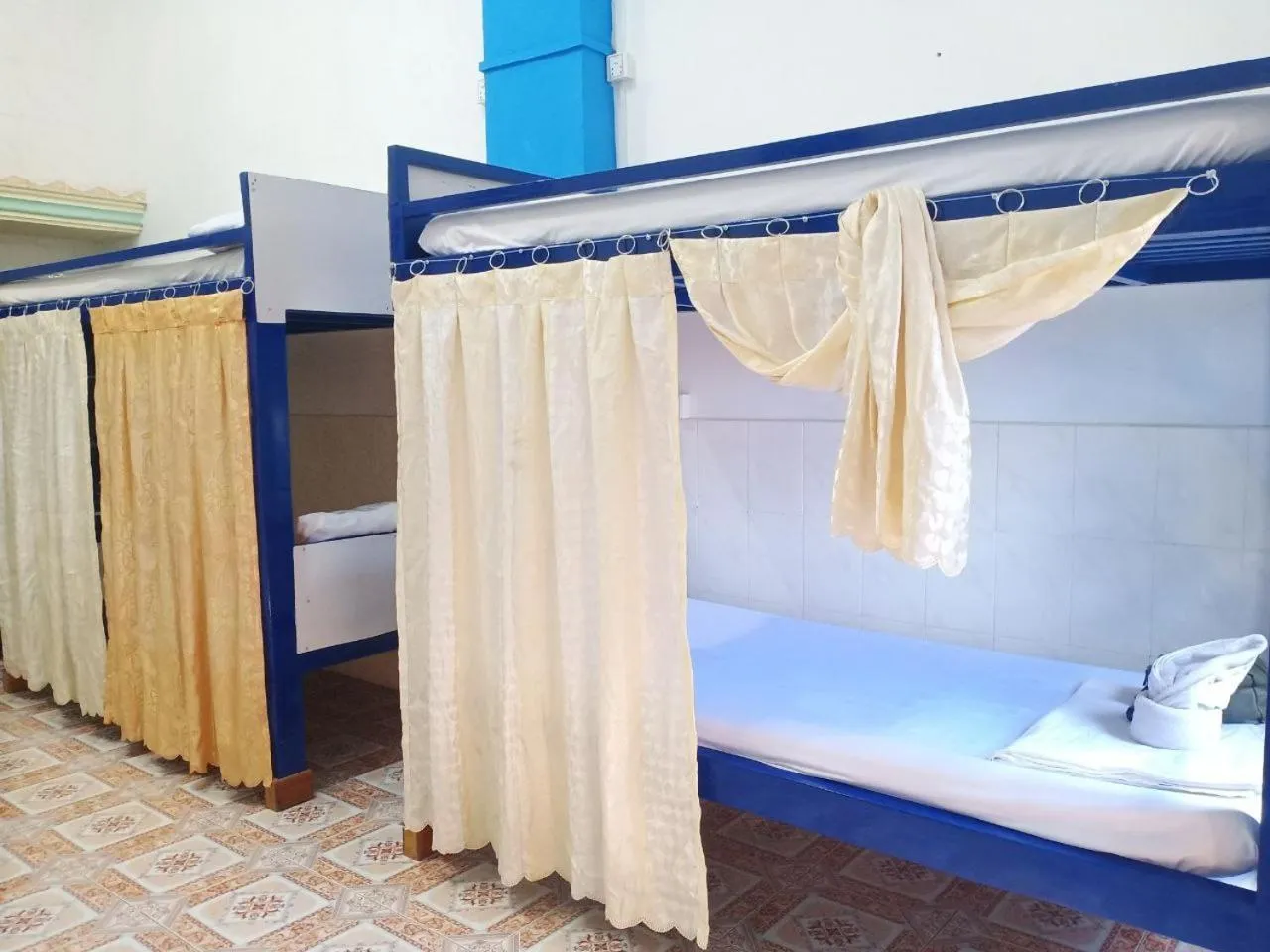 Bed in Silver Dolphin Guesthouse & Restaurant