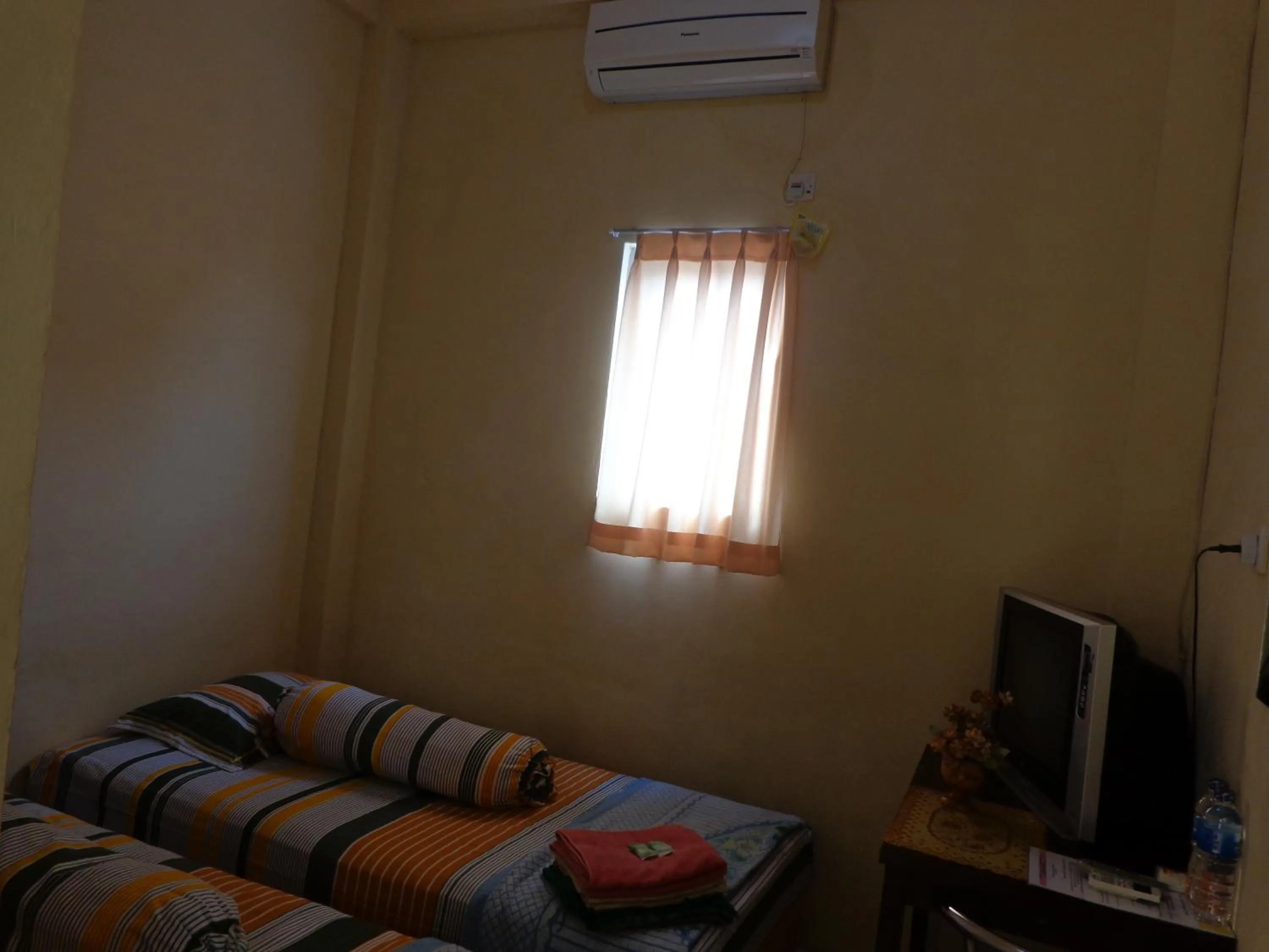 Bed in Hotel Musafir Inn