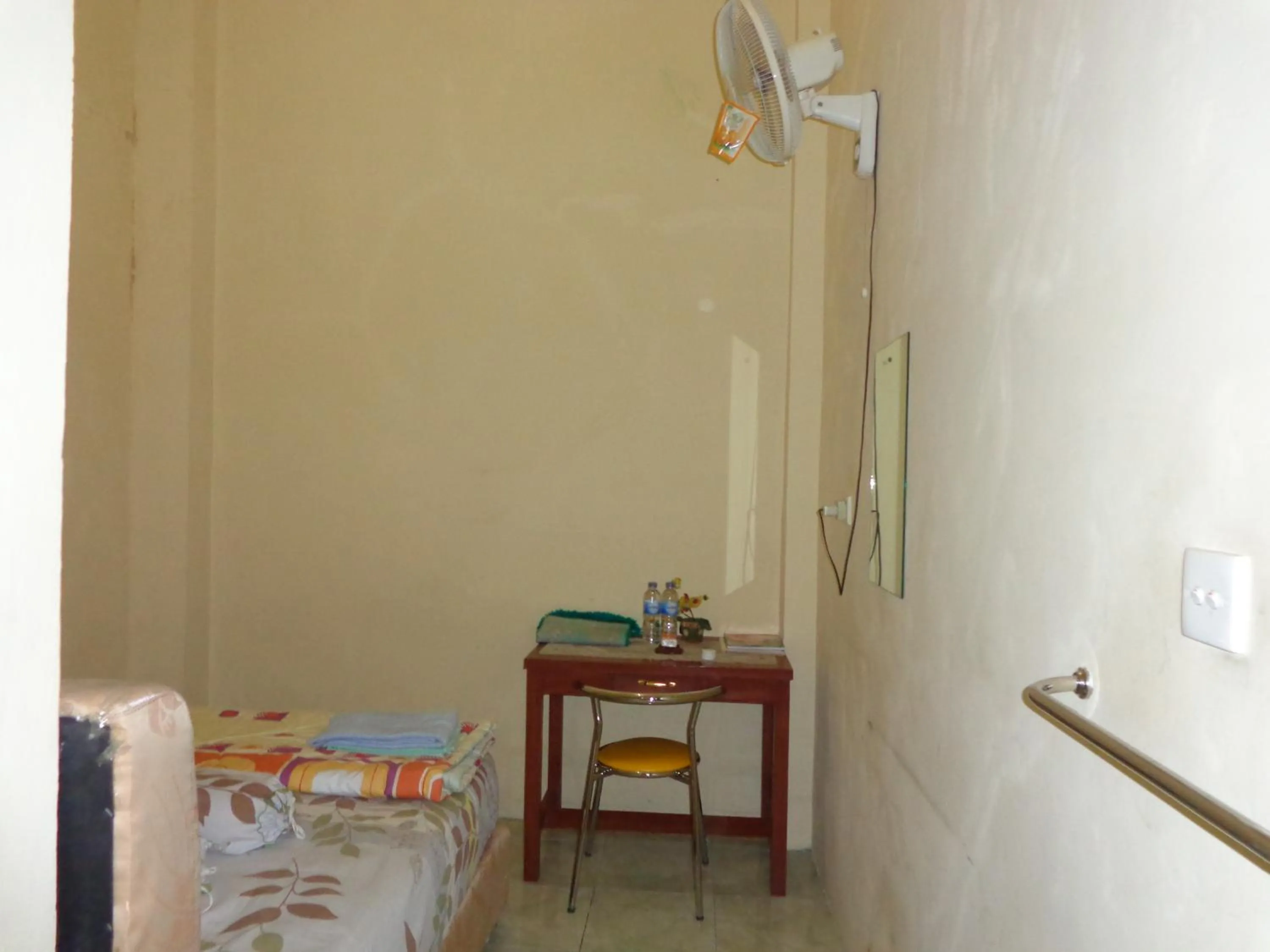 Bed in Hotel Musafir Inn