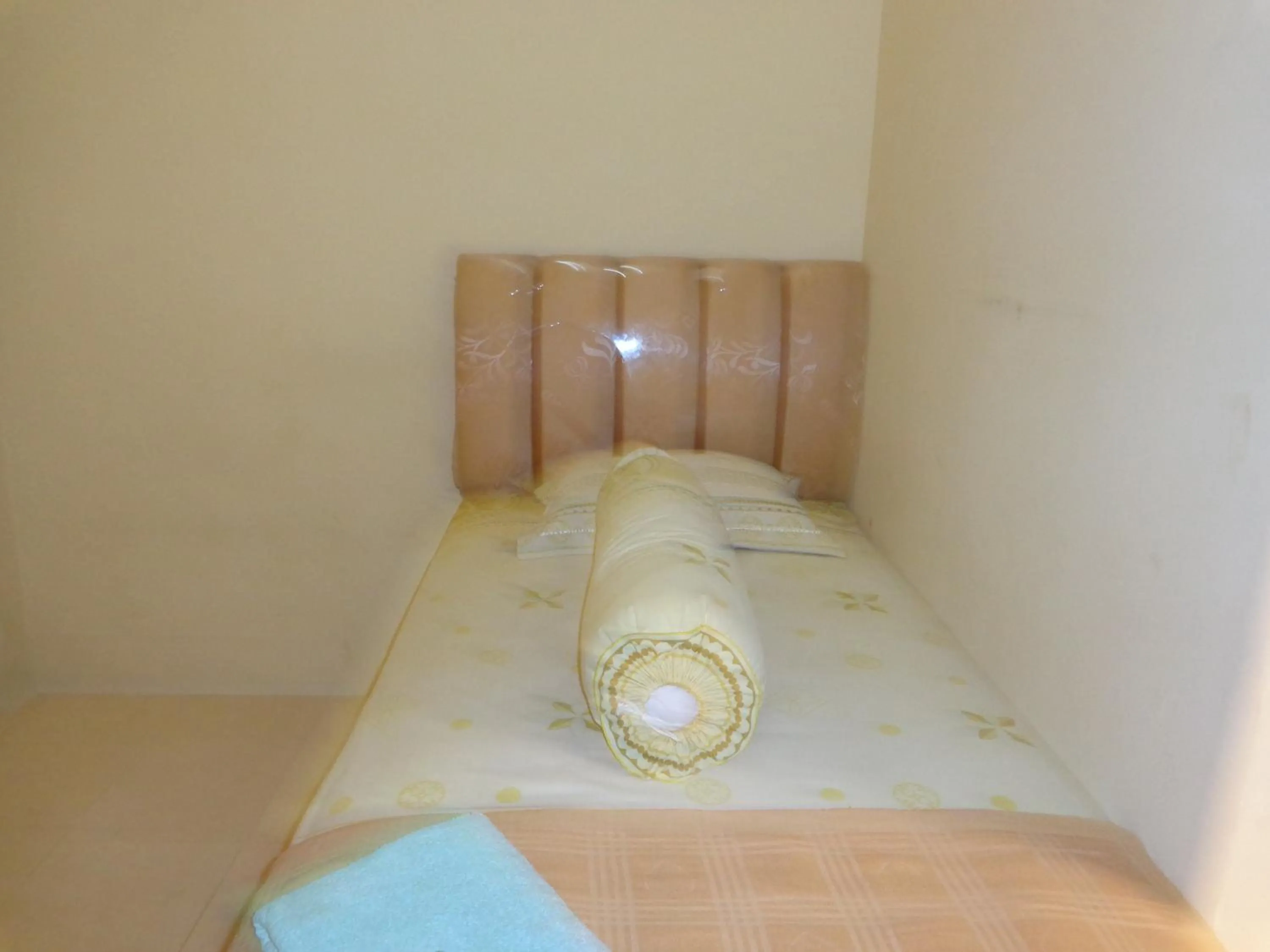 Bed in Hotel Musafir Inn