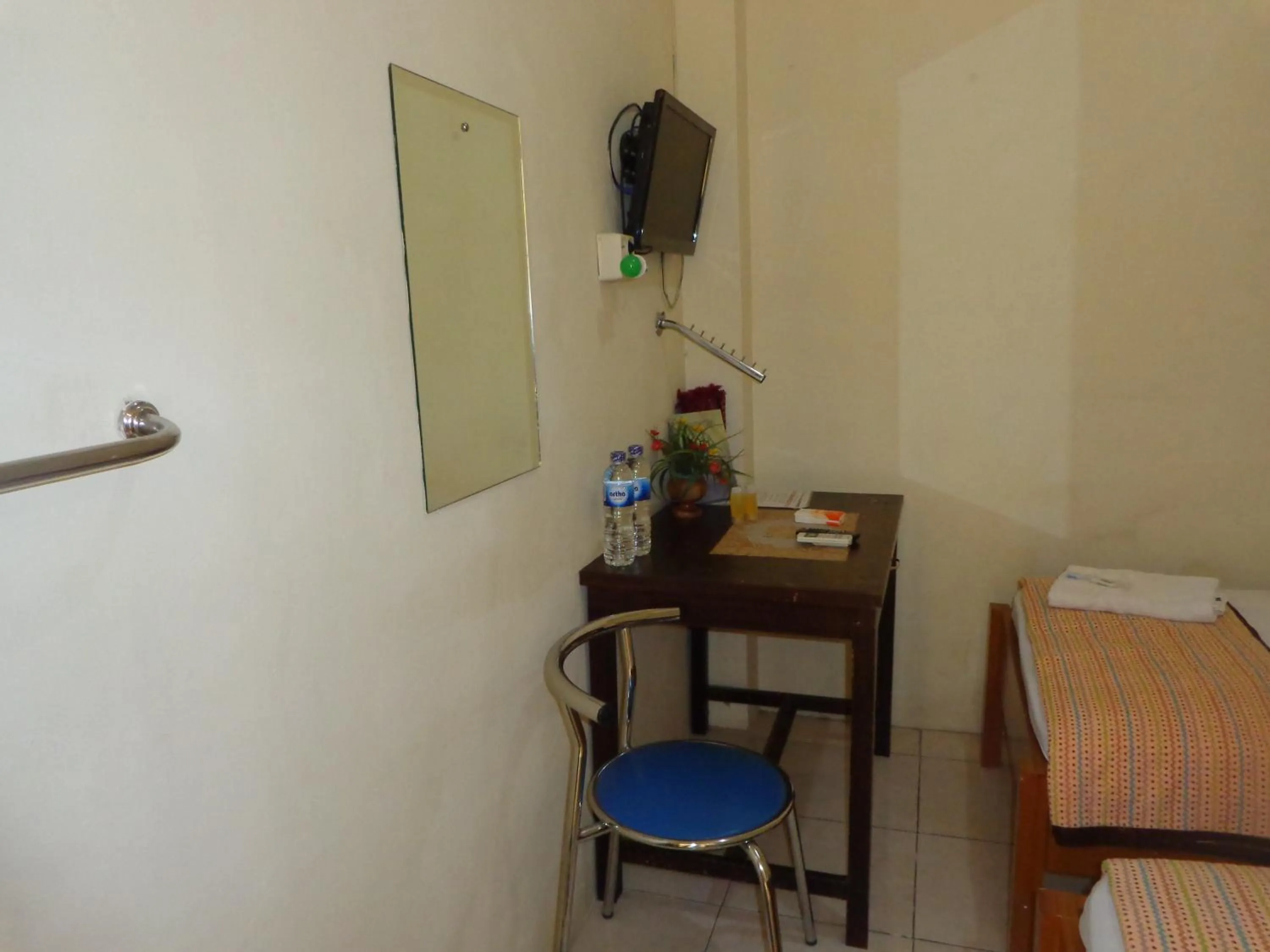 Bed in Hotel Musafir Inn