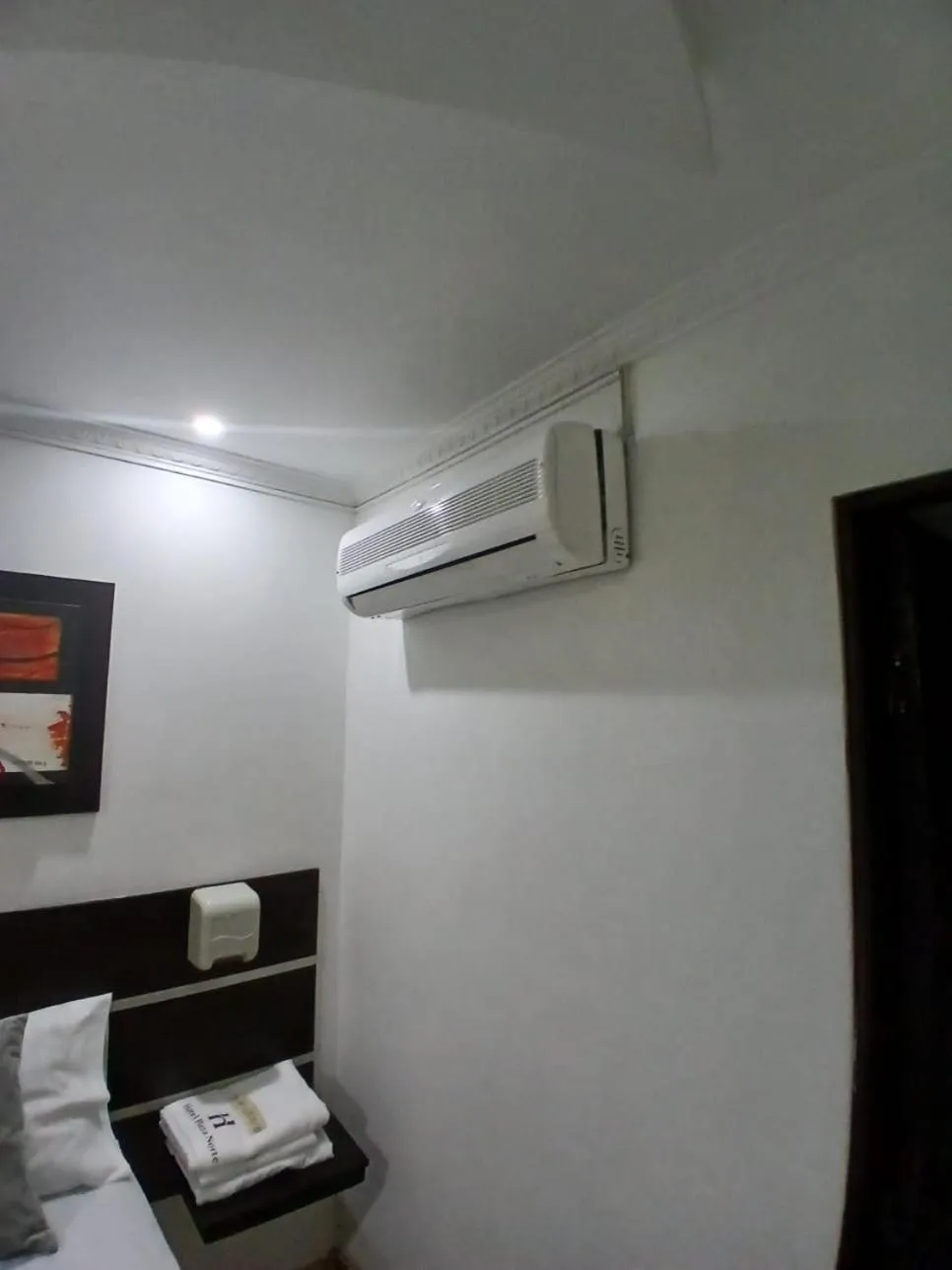 air conditioner, Bed in Hotel Plaza Norte Cali