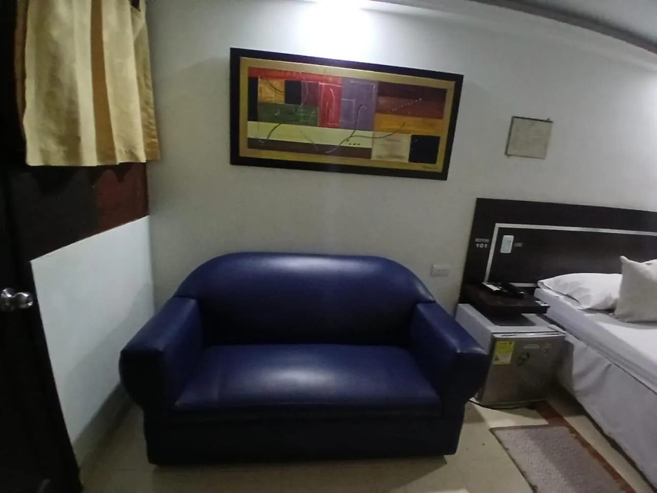 Seating area, Bed in Hotel Plaza Norte Cali