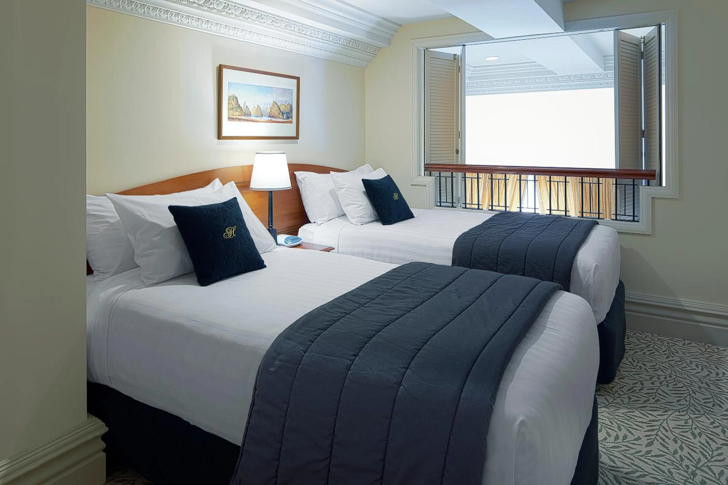 Bed in Adina Heritage Christchurch