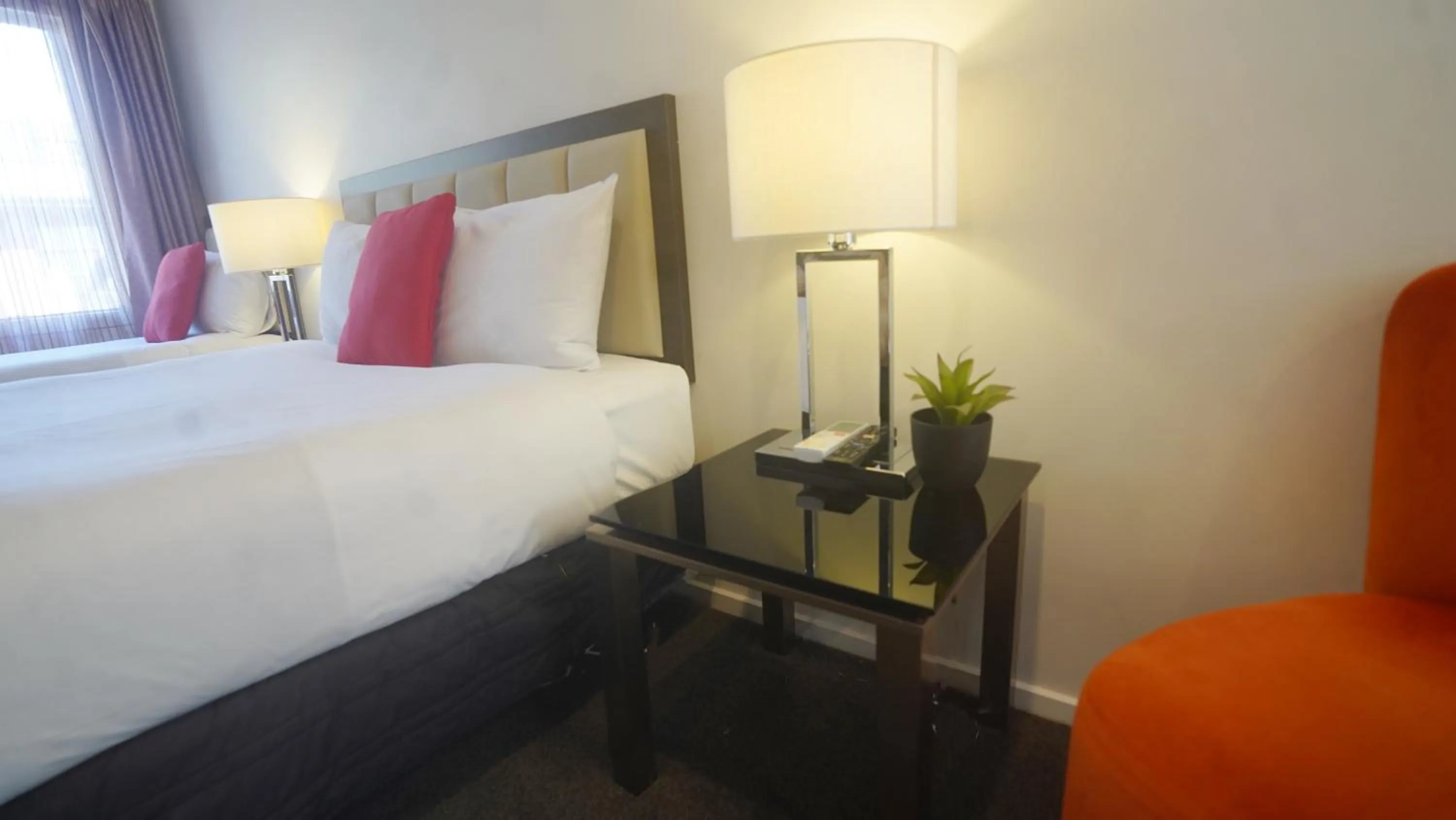 Bed in Abbey Motor Lodge