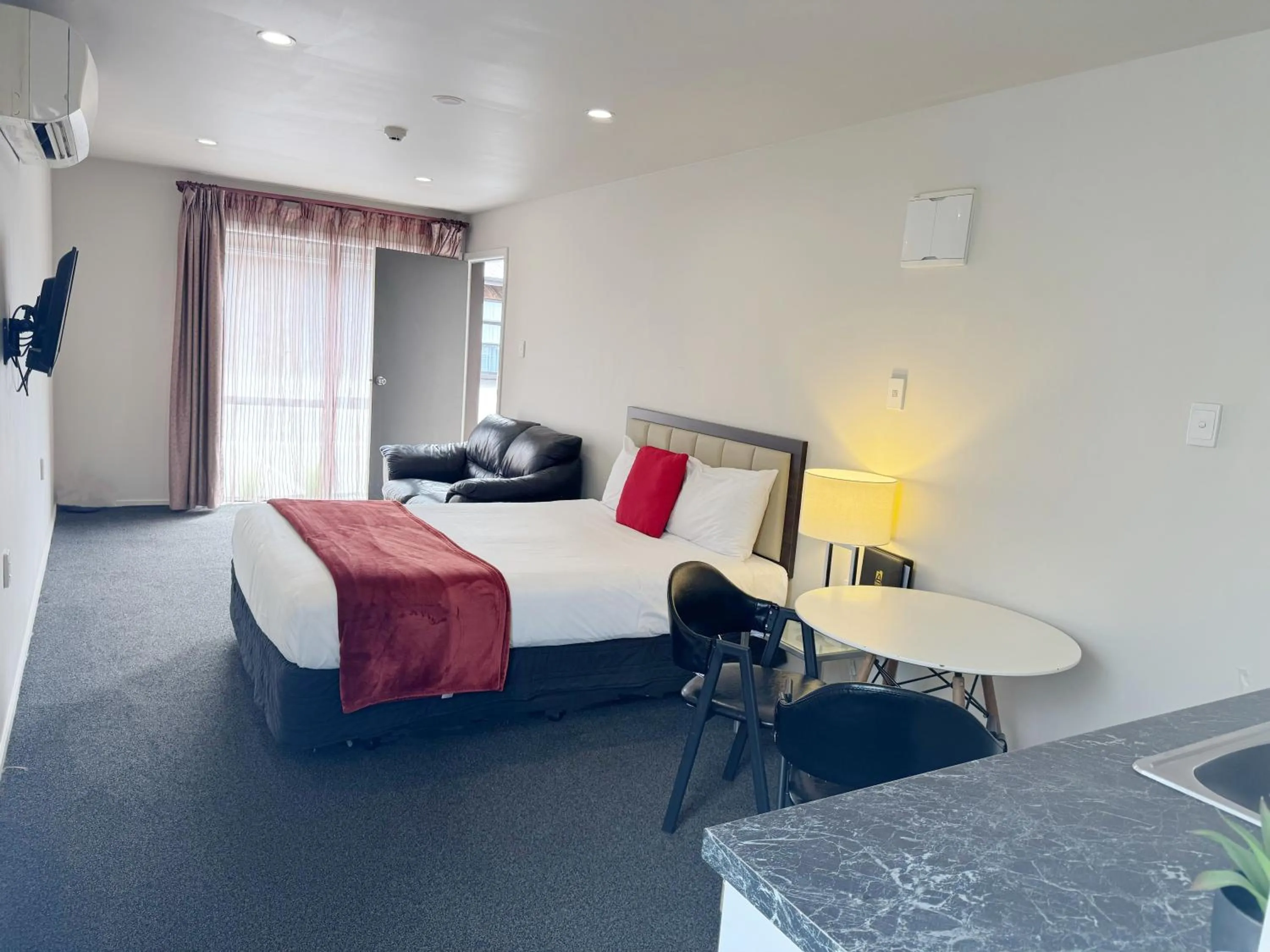 Bed in Abbey Motor Lodge