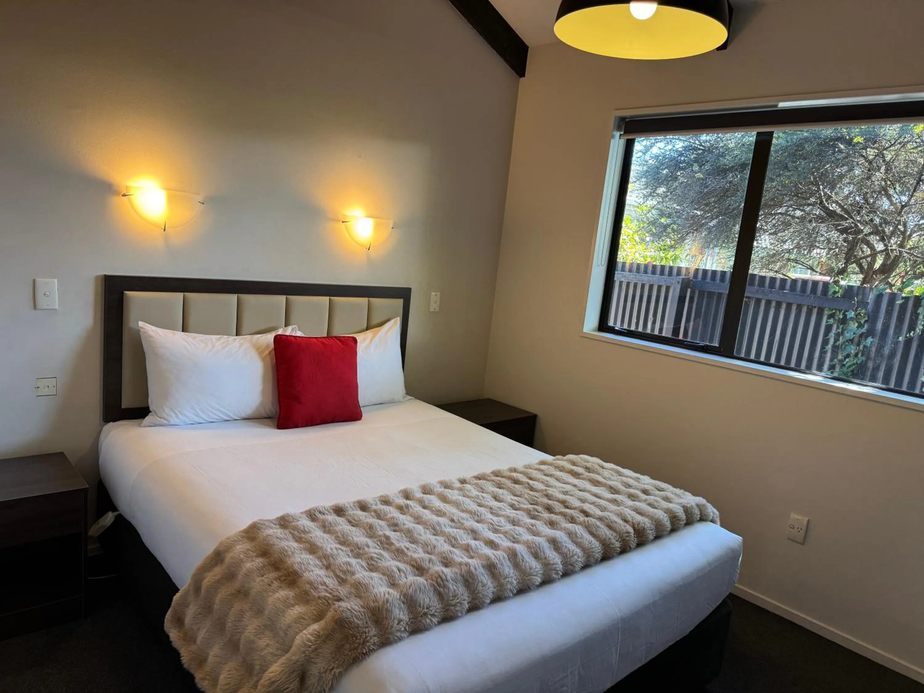 Bed in Abbey Motor Lodge
