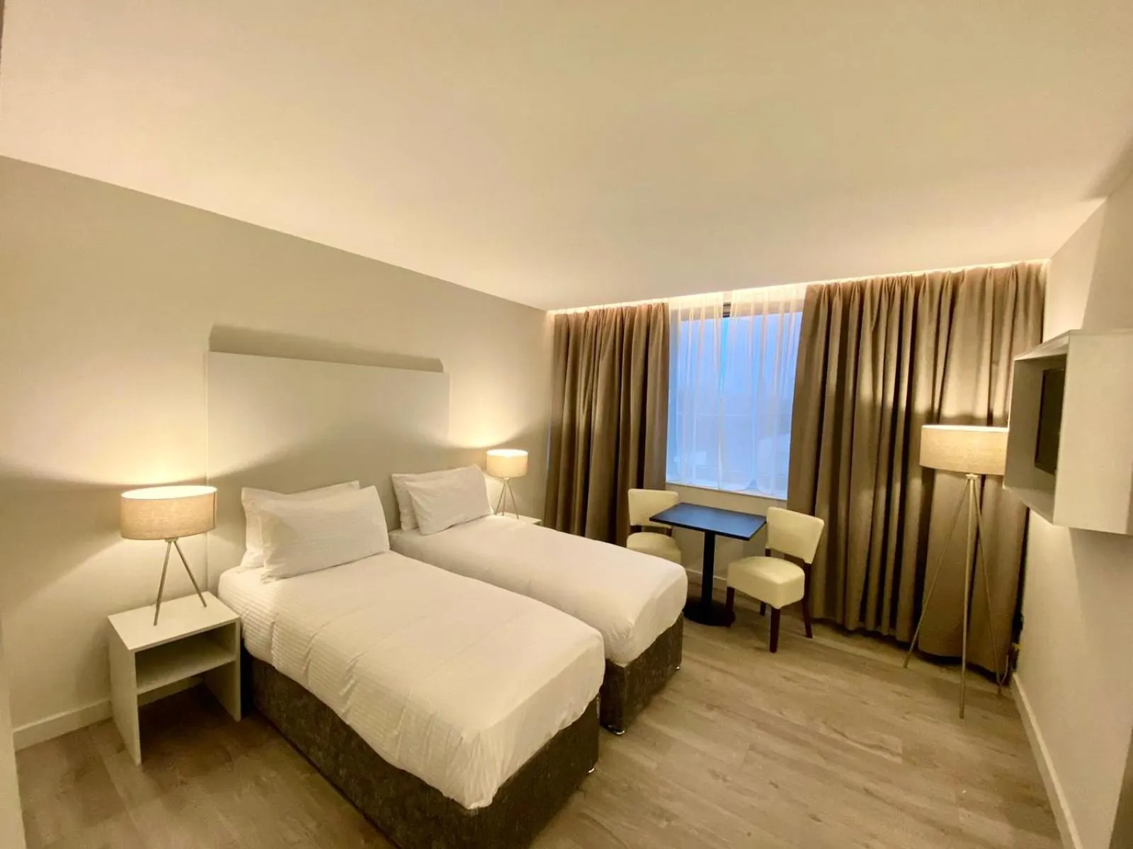 Bed in Axiom Park Hotel