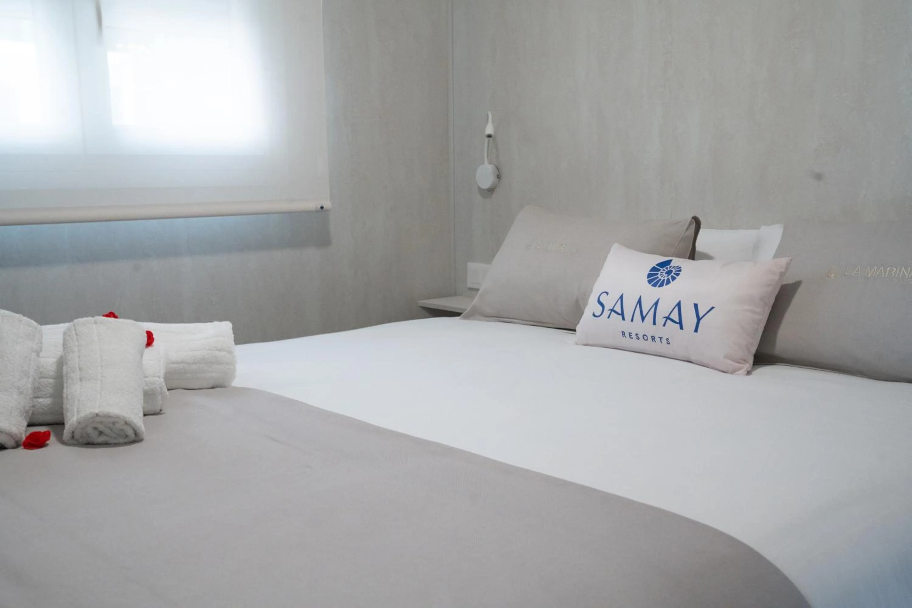 Bed in La Marina Resort