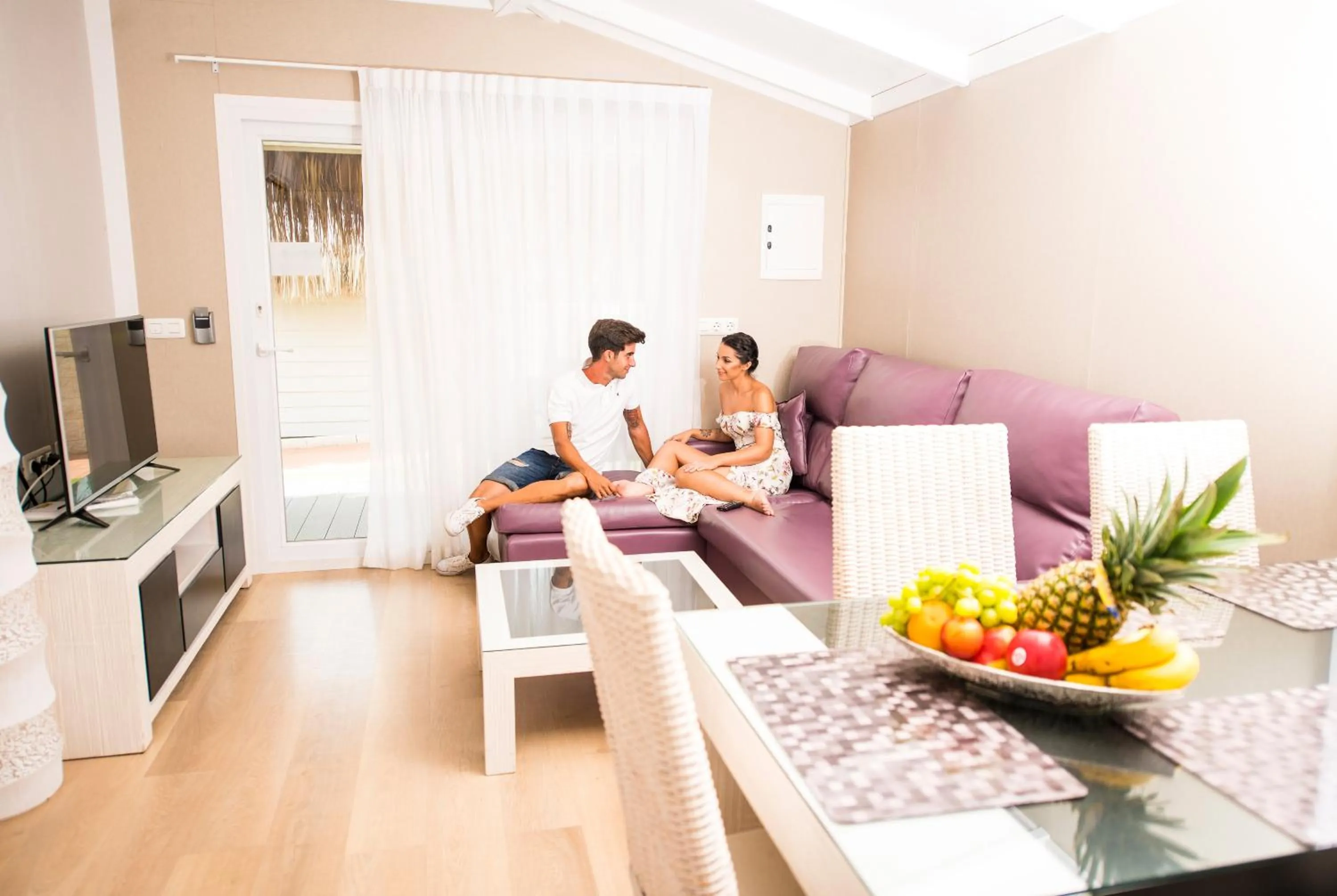 Communal lounge/ TV room in La Marina Resort