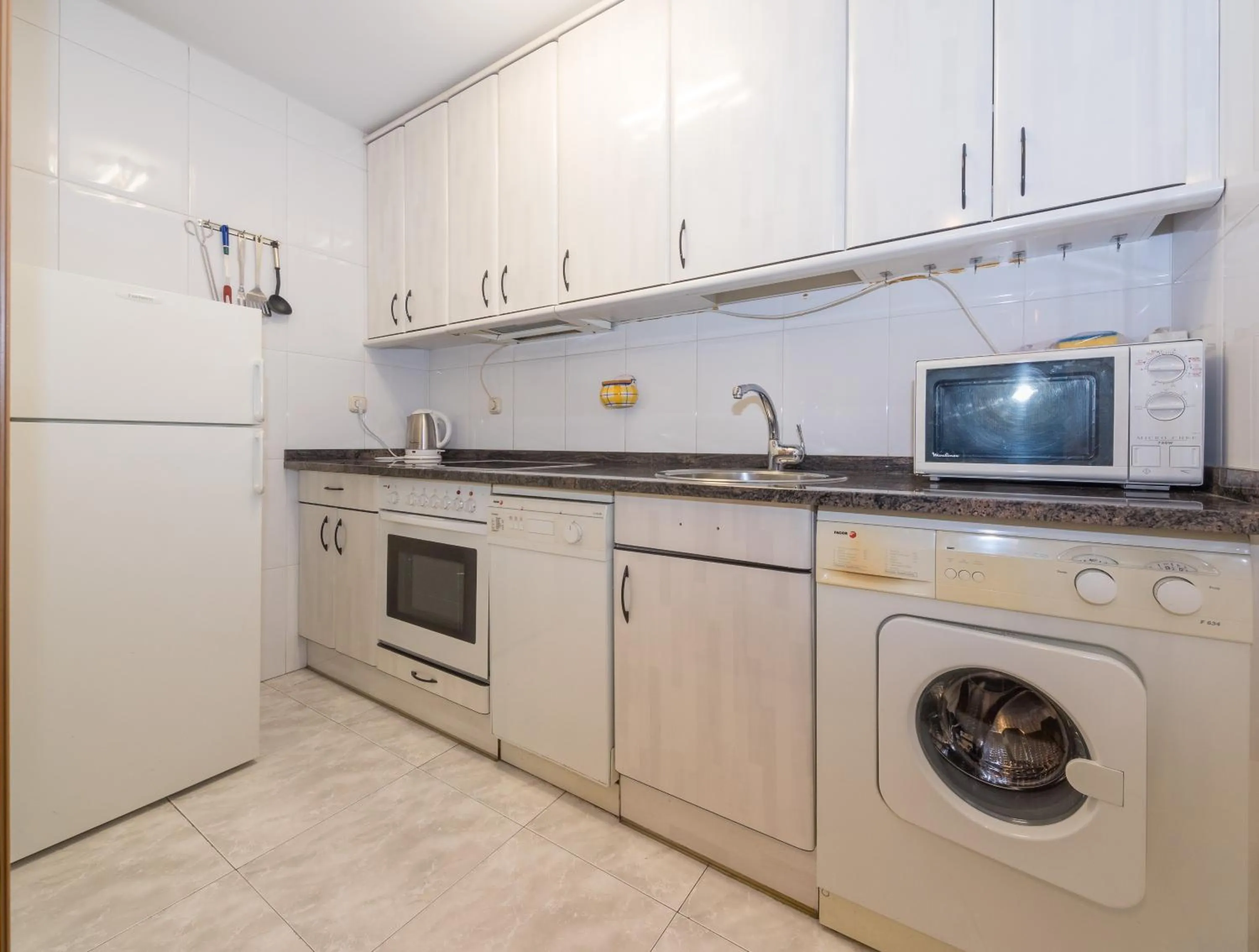 Kitchen or kitchenette in Gestión de Alojamientos Apartments