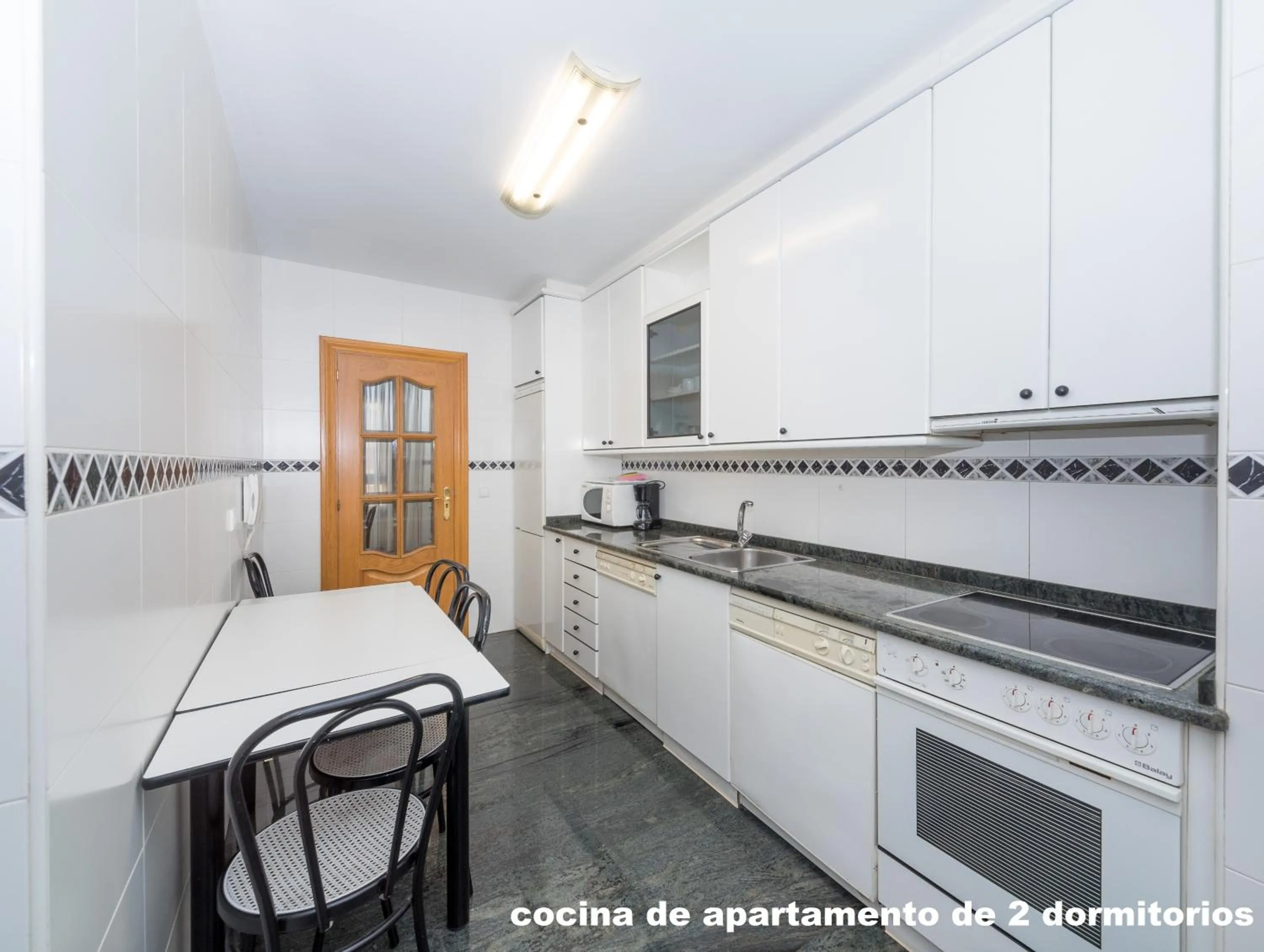 Kitchen or kitchenette in Gestión de Alojamientos Apartments