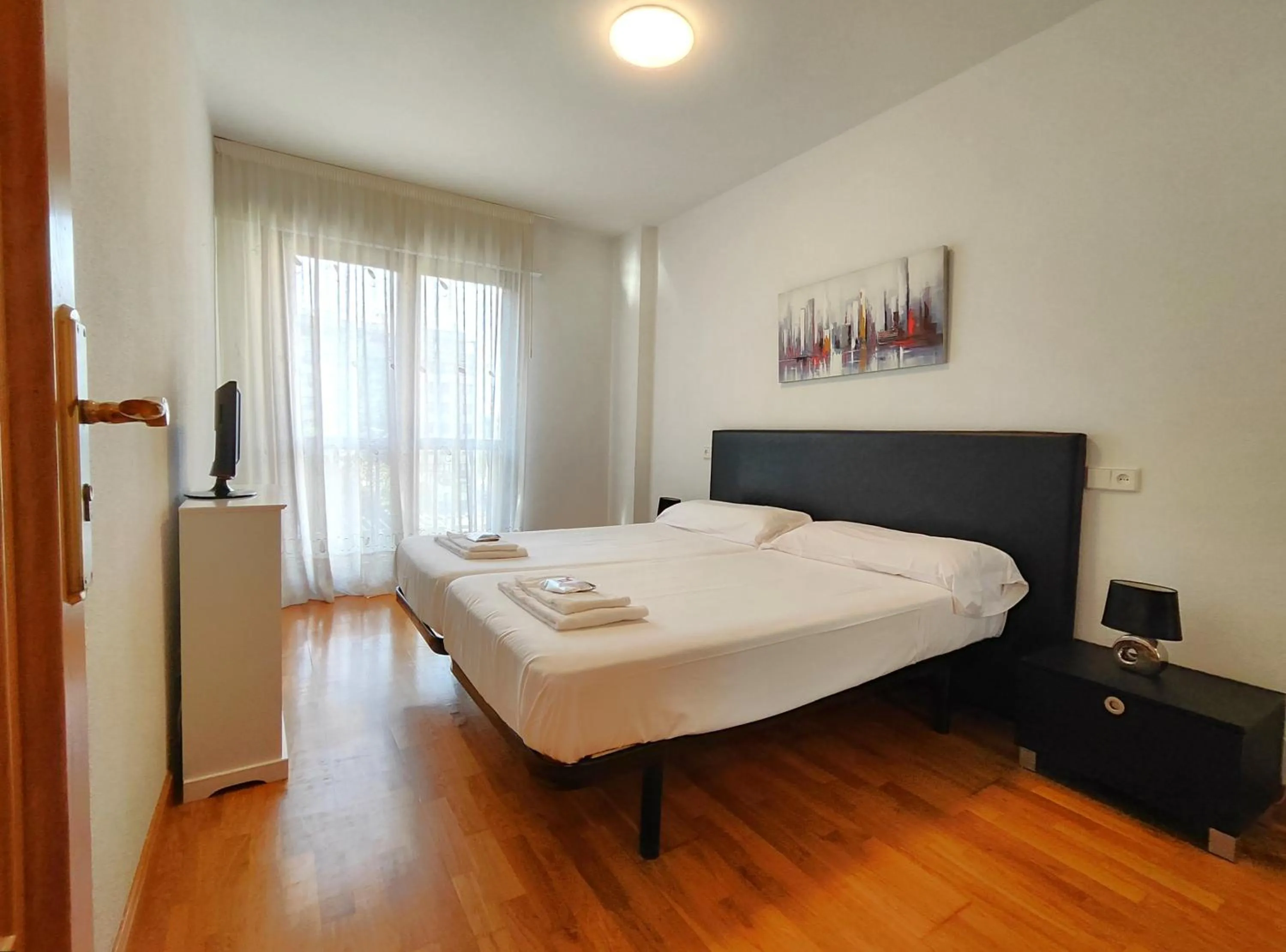 Bed in Gestión de Alojamientos Apartments