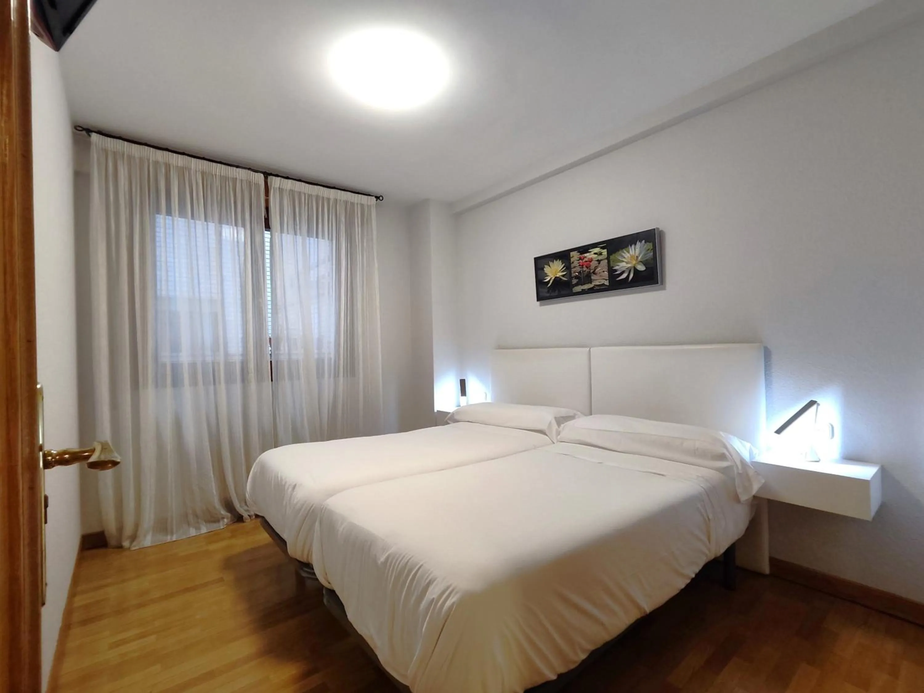 Bed in Gestión de Alojamientos Apartments