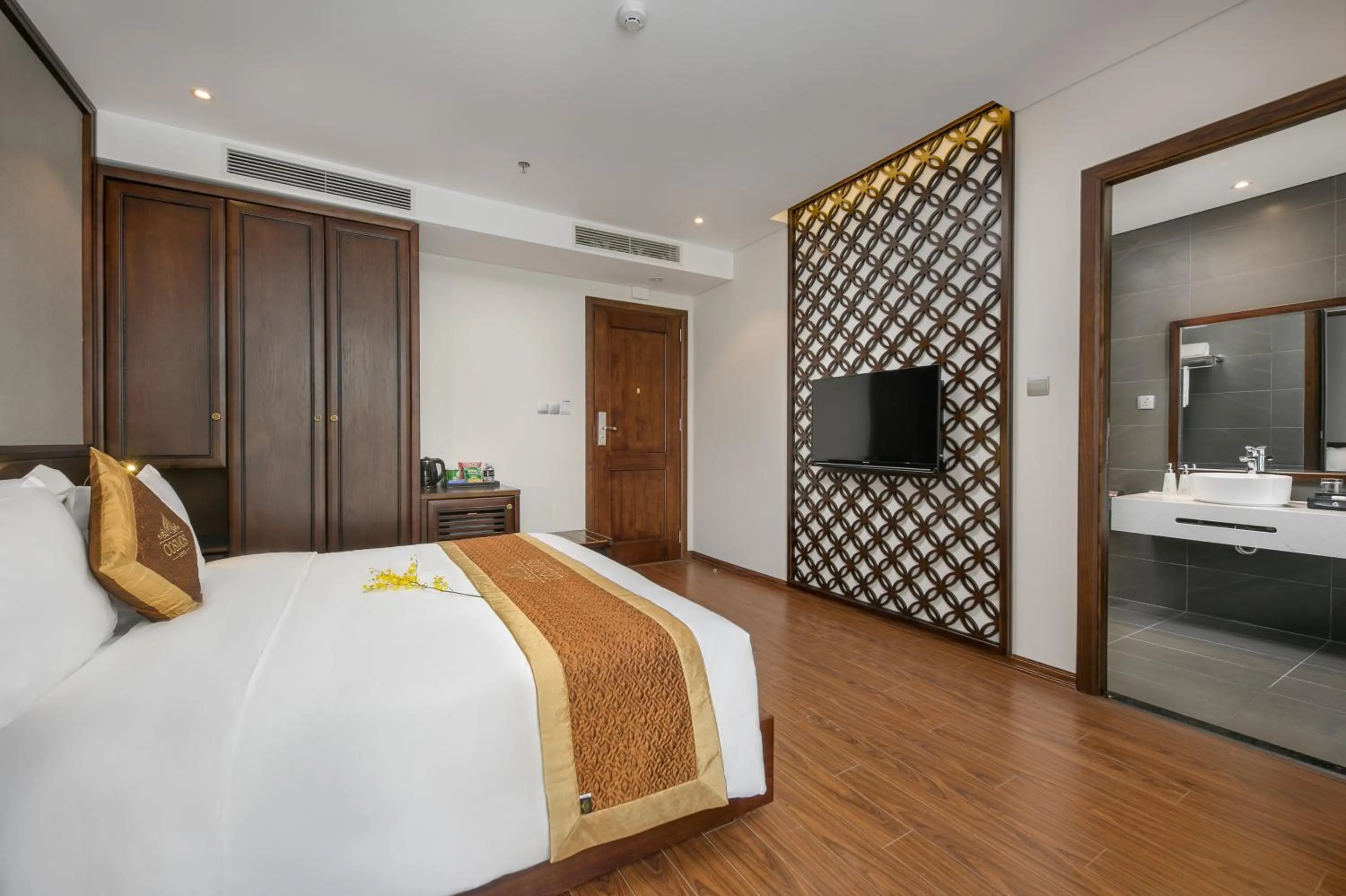 Communal lounge/ TV room, Bed in Cosmos Hotel Danang