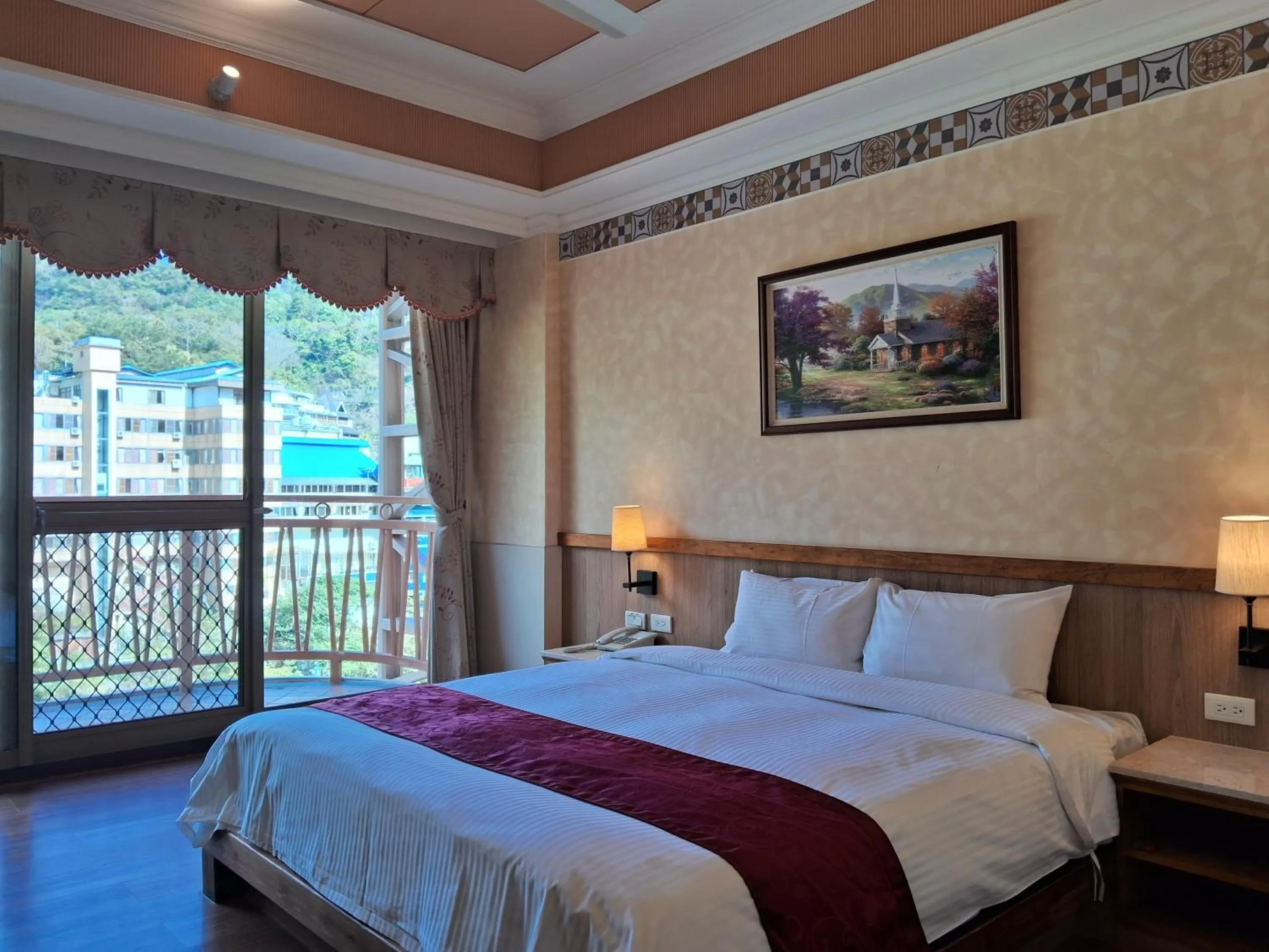 Bed in Ku Kuan Resort Hotel