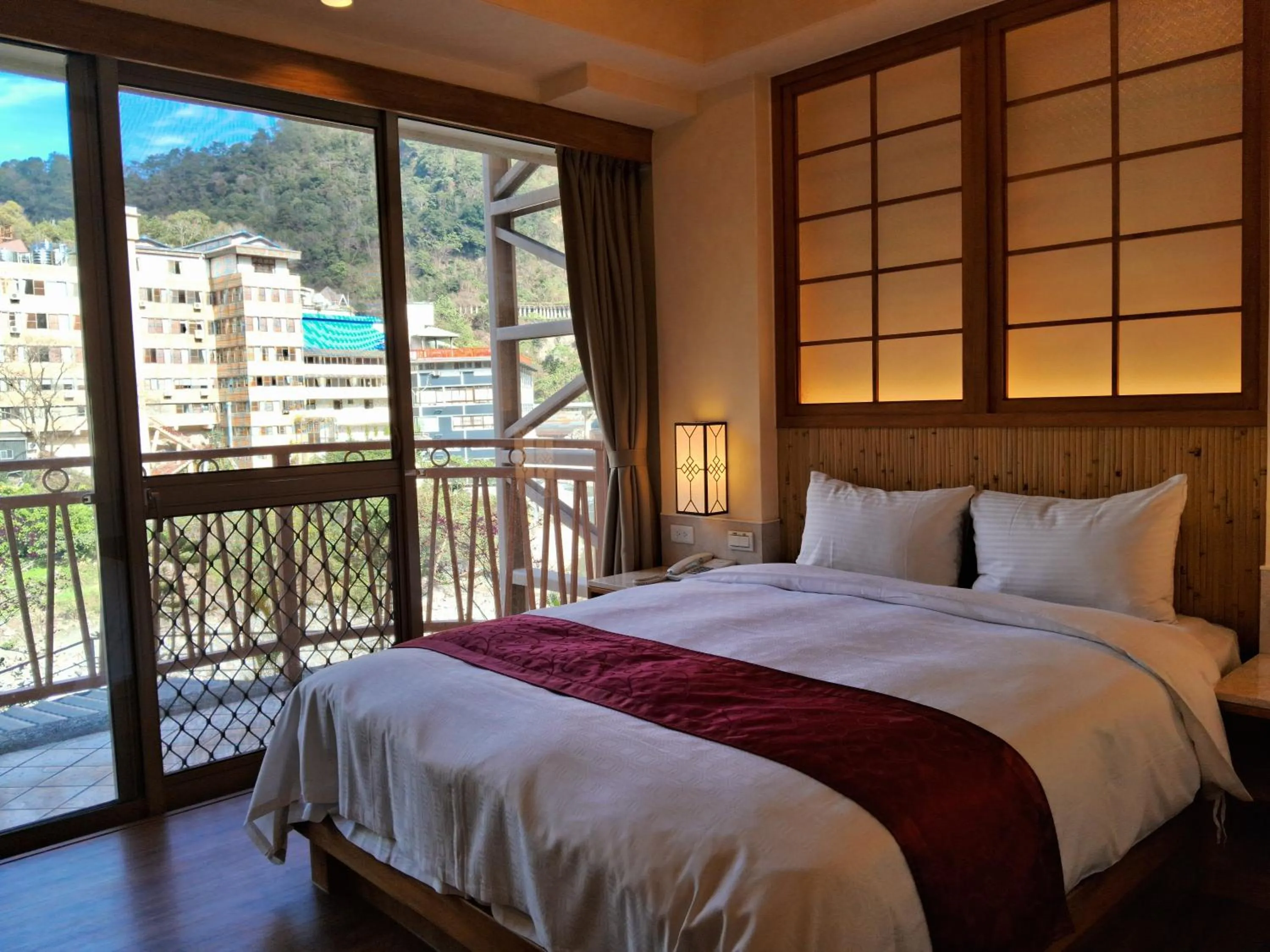 Bed in Ku Kuan Resort Hotel