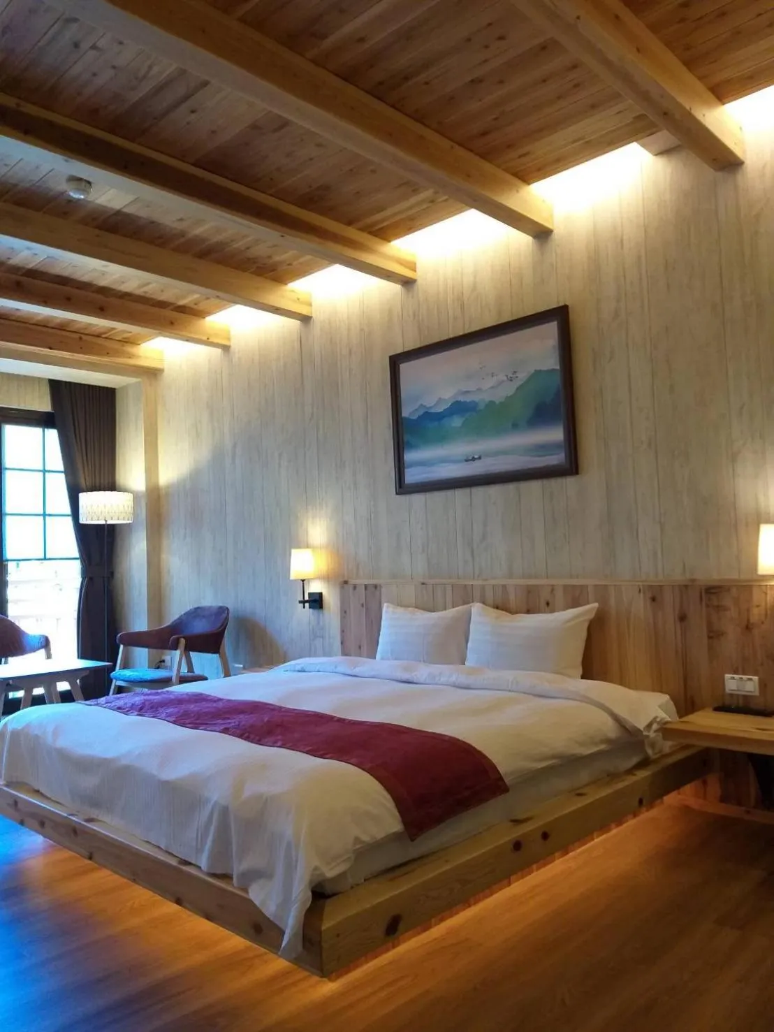 Bed in Ku Kuan Resort Hotel