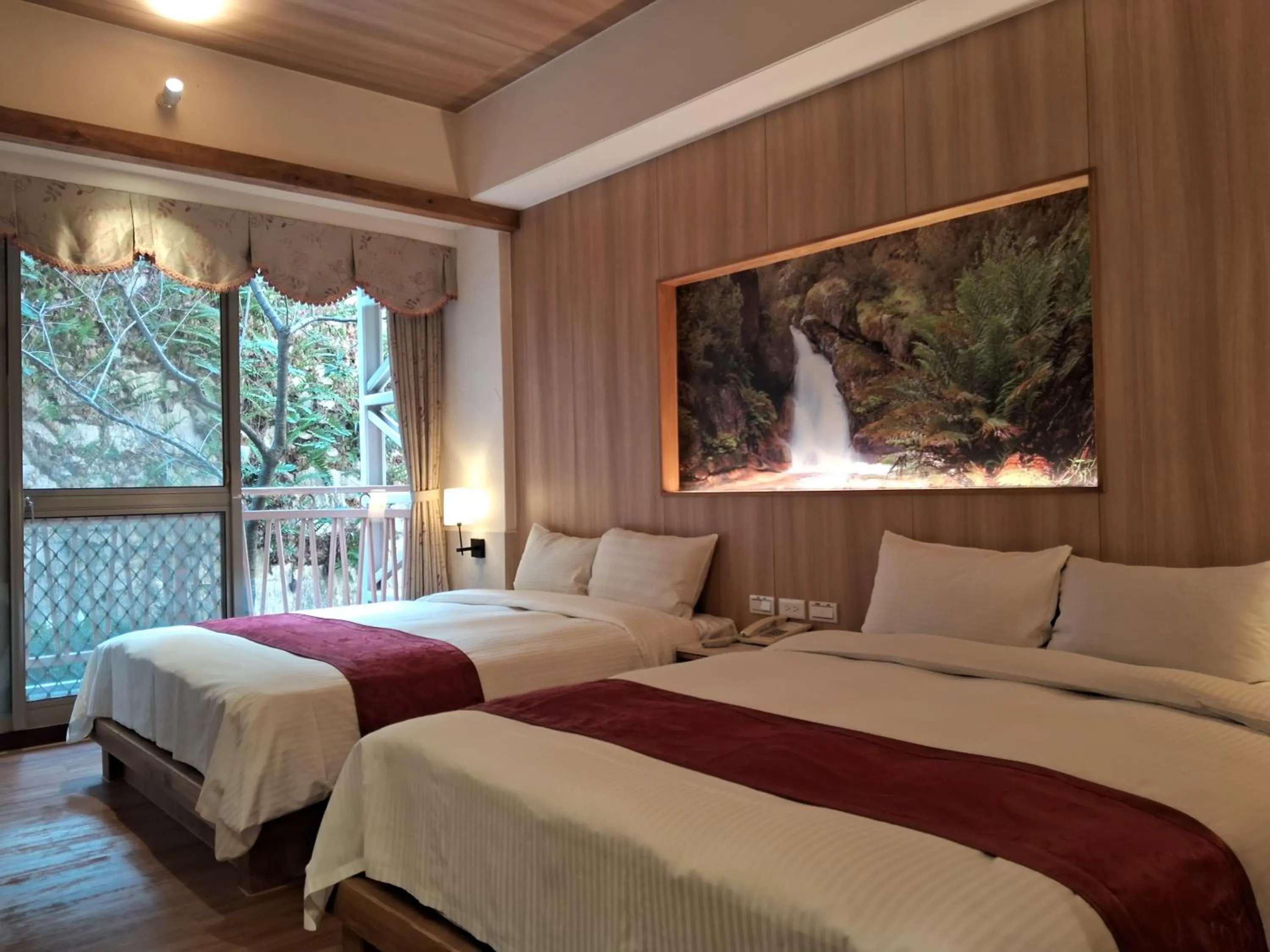 Bed in Ku Kuan Resort Hotel