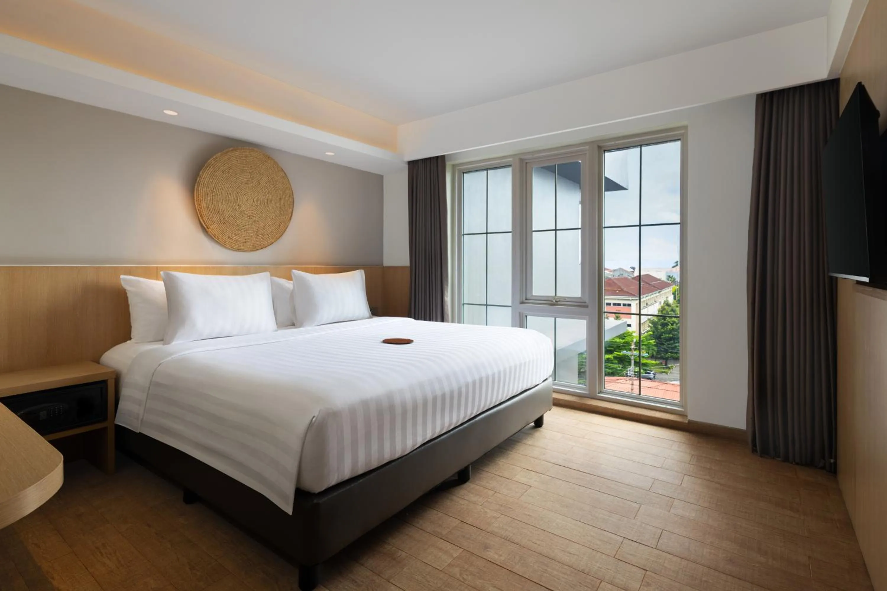 Bedroom, Bed in Aveta Hotel Malioboro