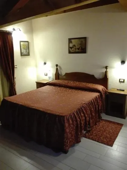 Bed in Affittacamere Les Noyers