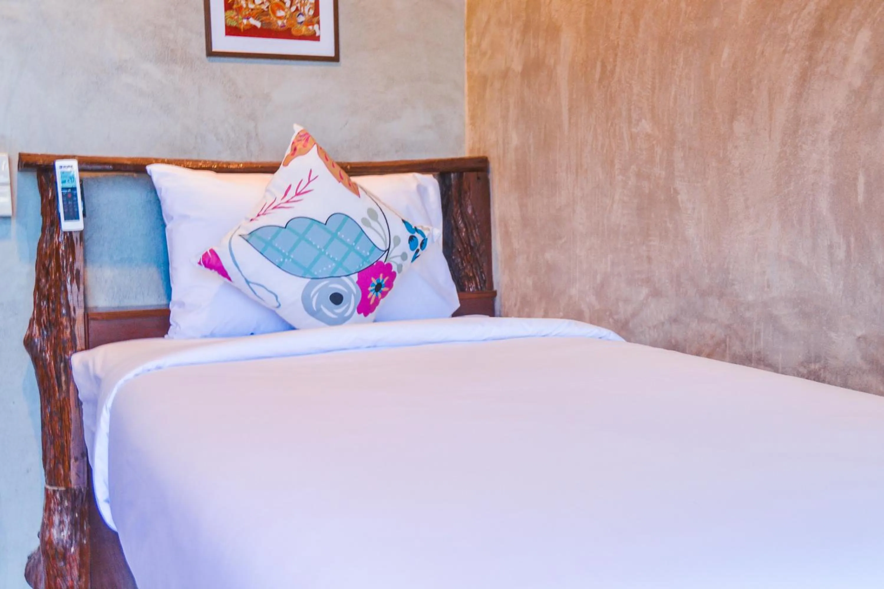 Bed in Baan Tubkaek Hotel