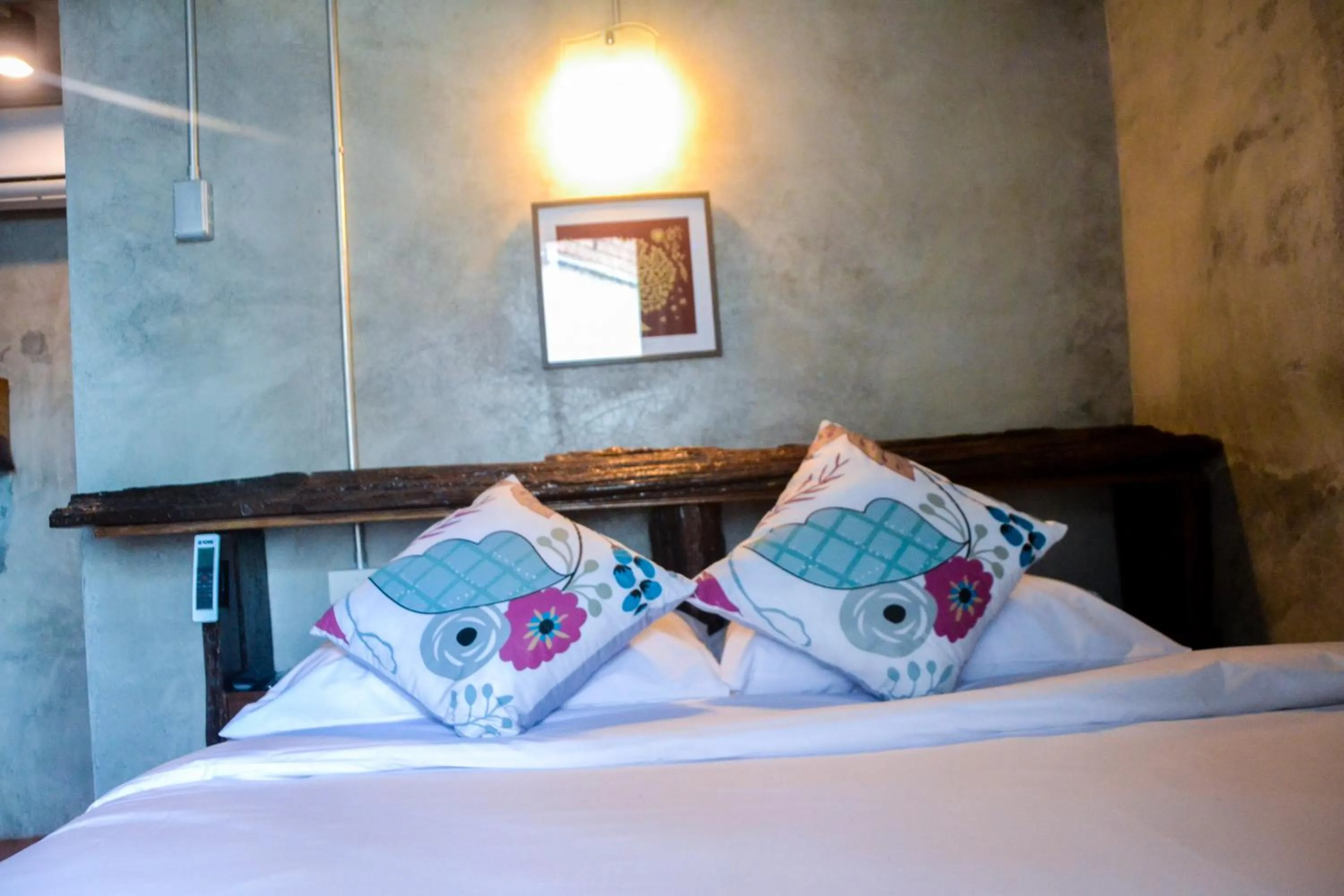 Bed in Baan Tubkaek Hotel