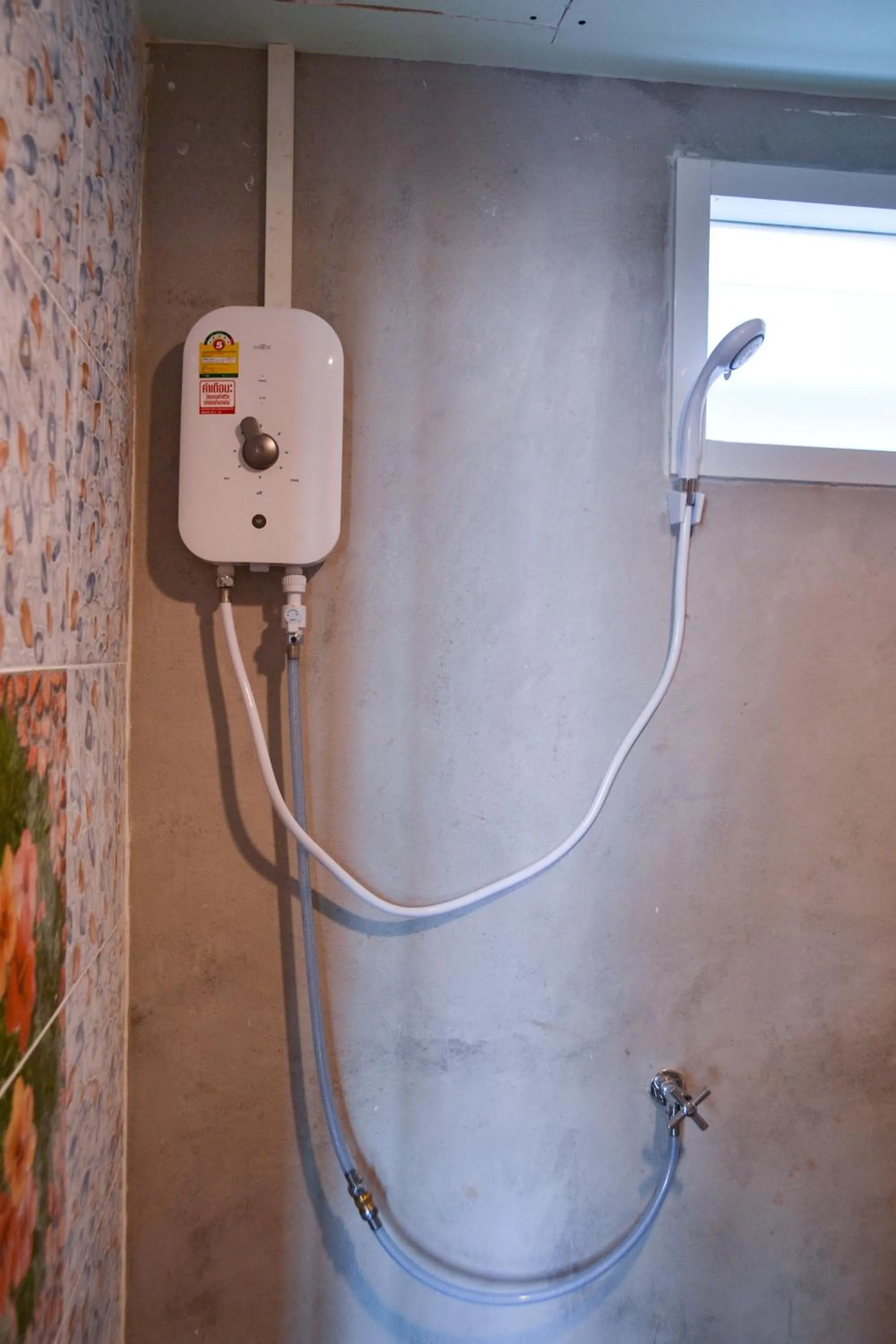 Shower in Baan Tubkaek Hotel