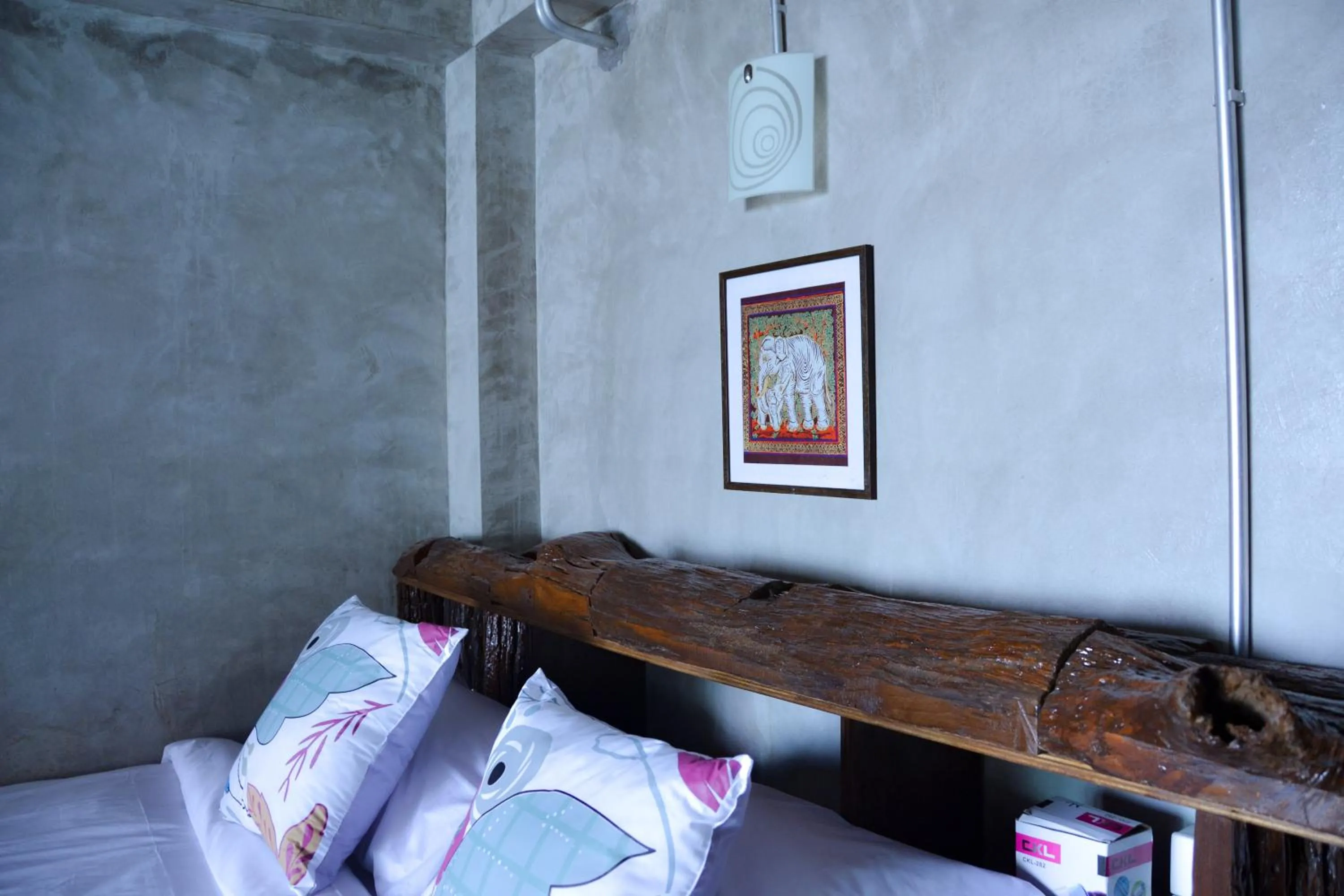 Bed in Baan Tubkaek Hotel