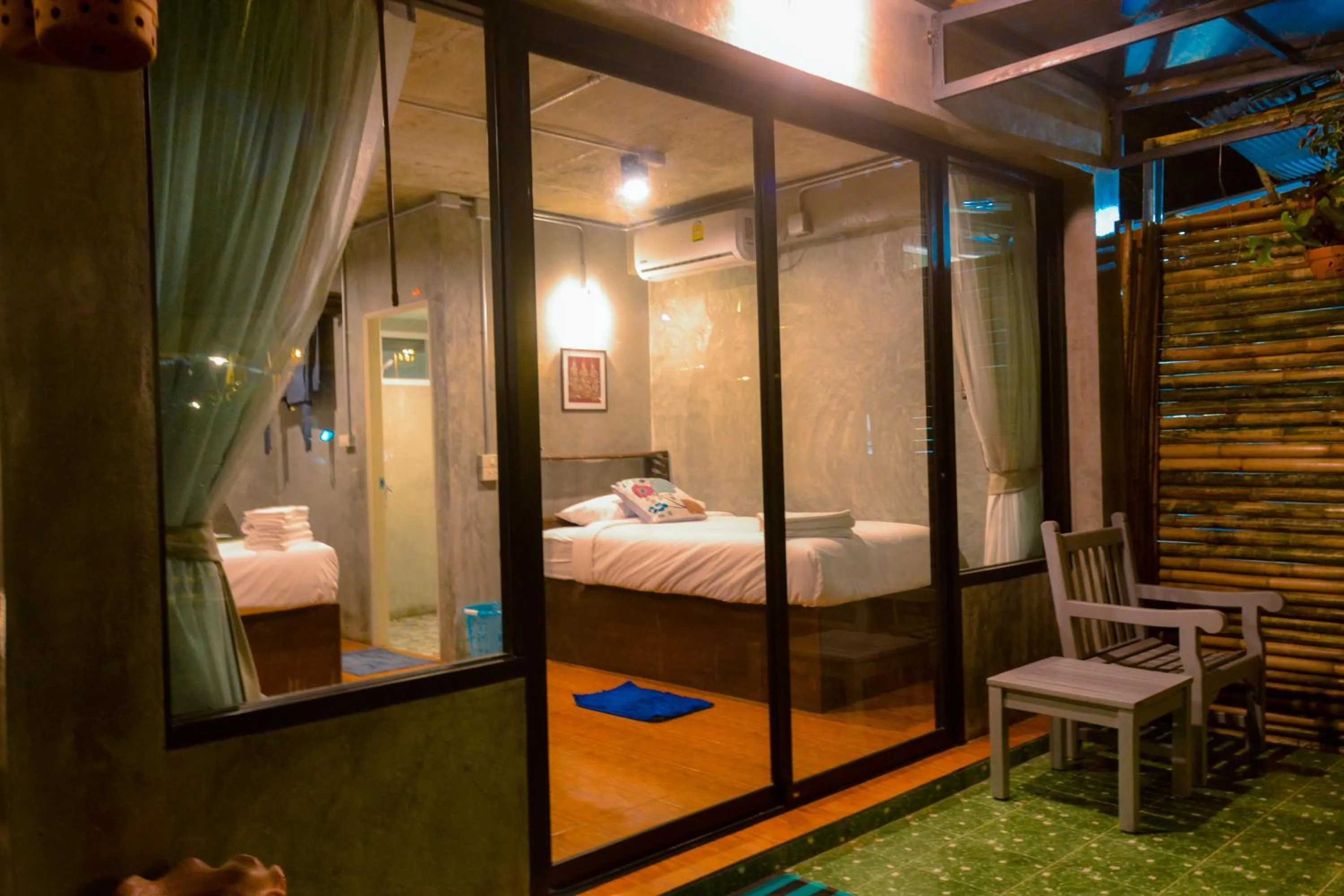 Bed in Baan Tubkaek Hotel