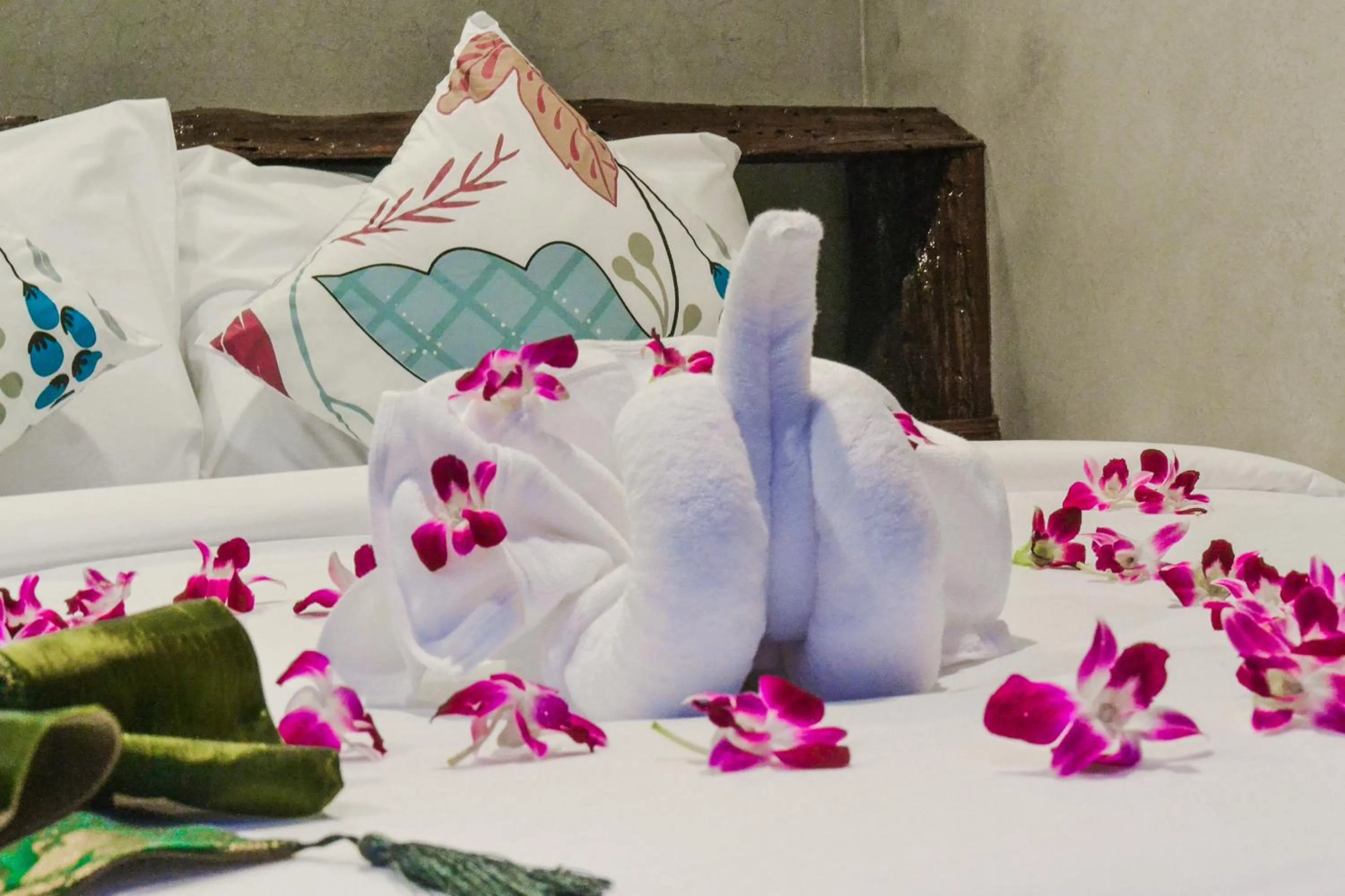 Bed in Baan Tubkaek Hotel