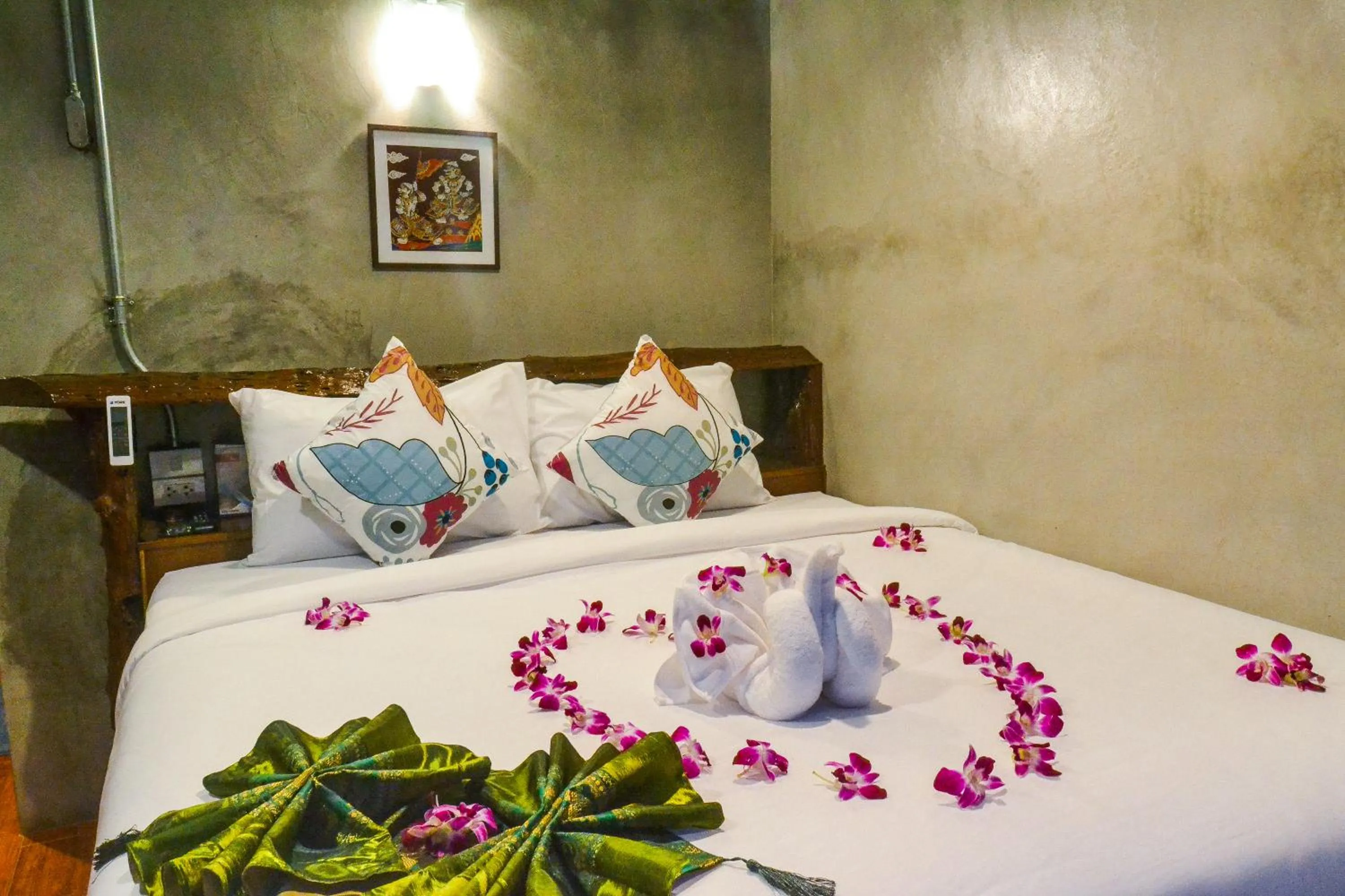 Bed in Baan Tubkaek Hotel