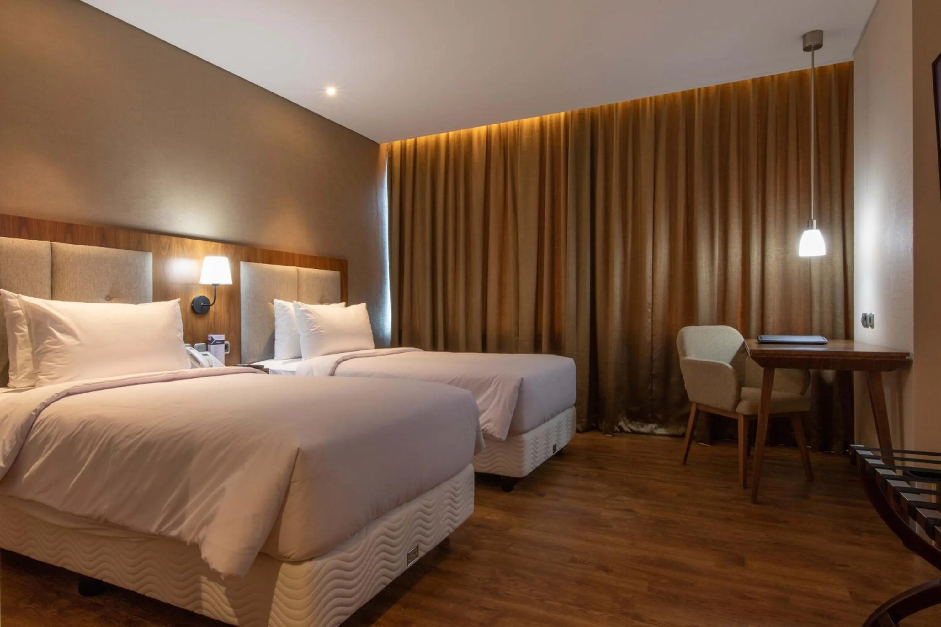 Bed in Avenzel Hotel & Convention Cibubur