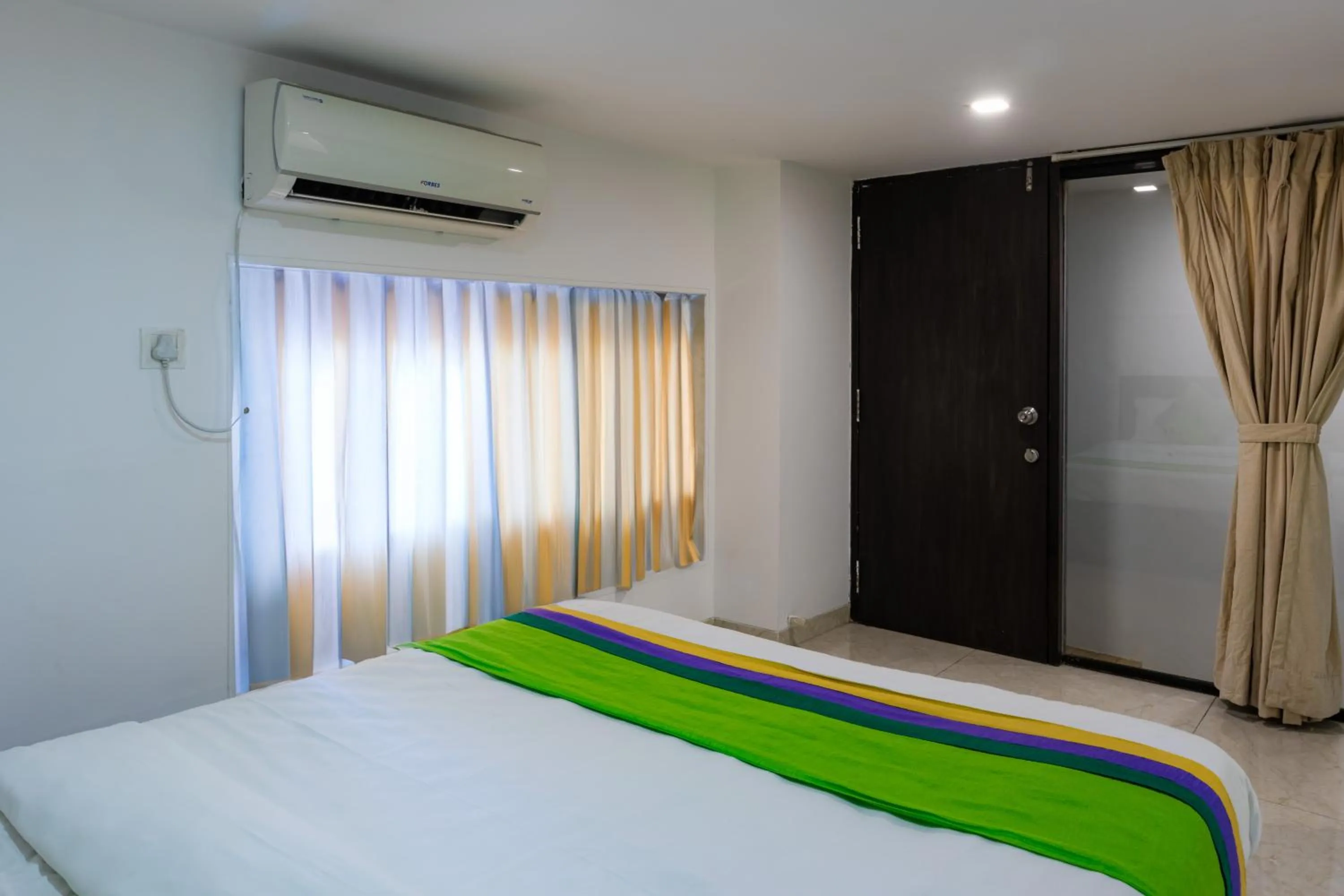 Bed in Treebo The Blue Roof