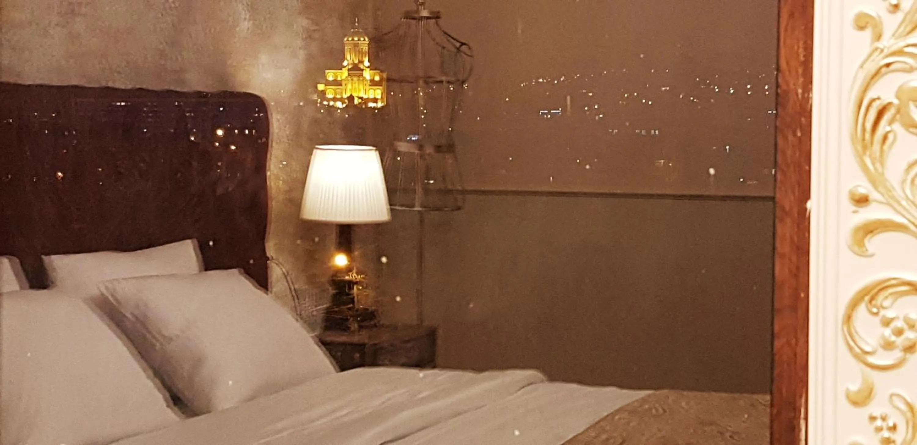 Decorative detail, Bed in Omart Hotel - Gallery