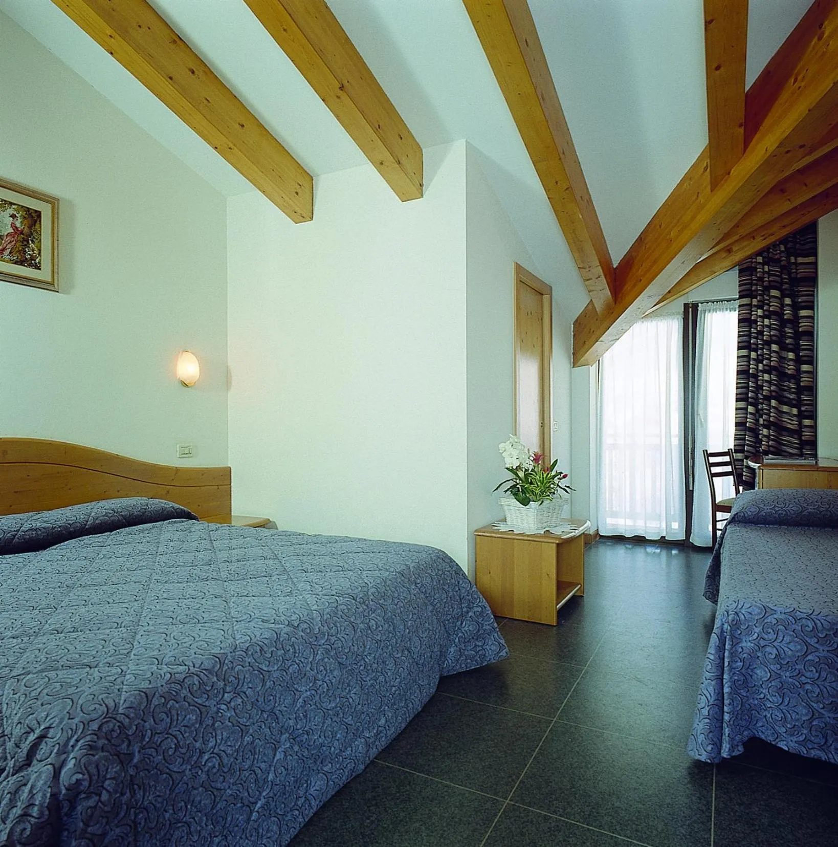 Bedroom in Hotel Al Plan Andalo