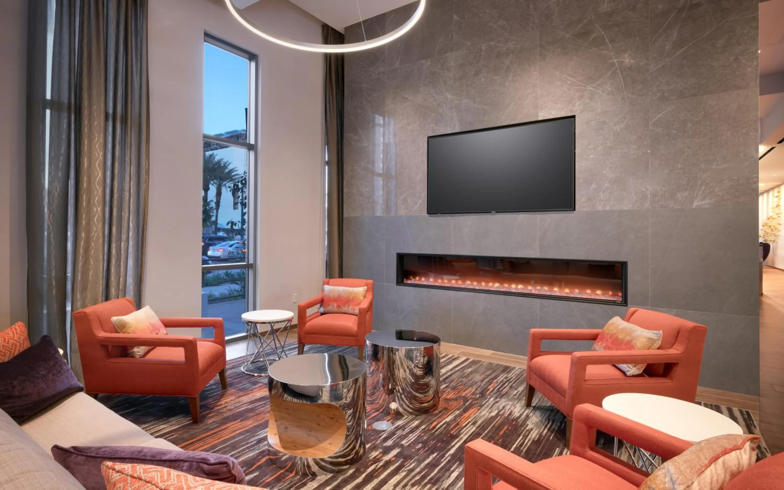 Communal lounge/ TV room in Hampton Inn & Suites Anaheim Resort Convention Center