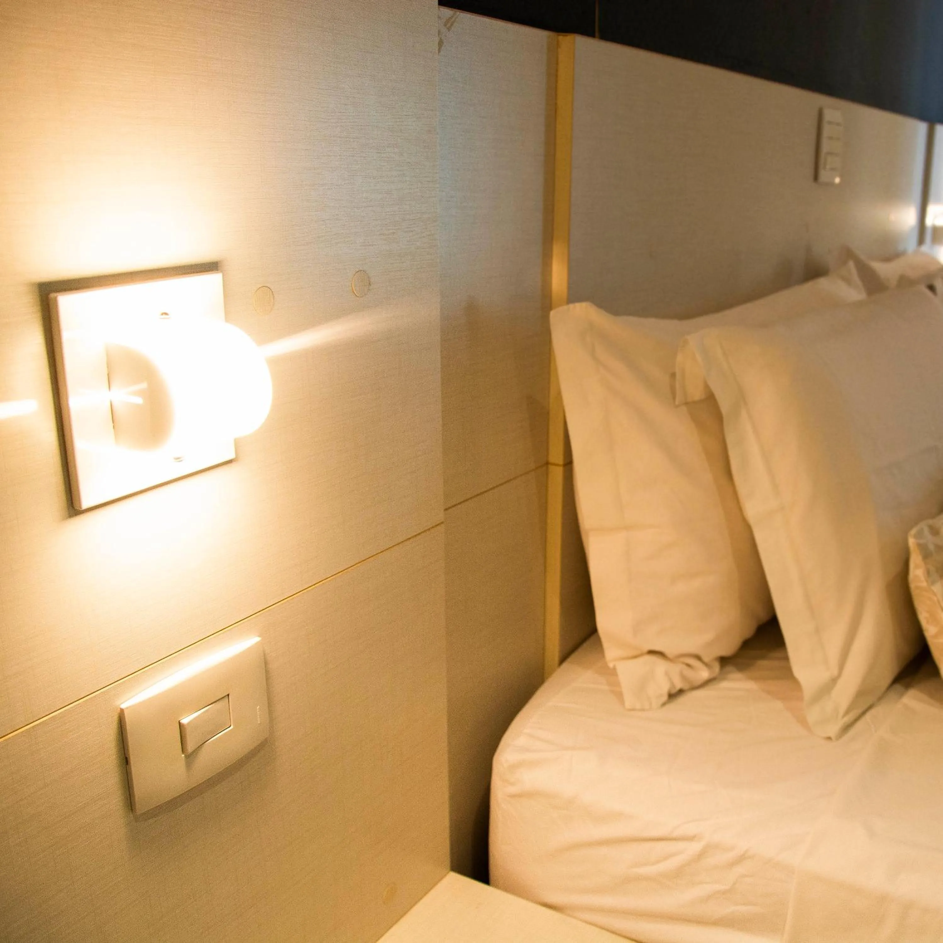 Bed in Golden Plaza Hotel