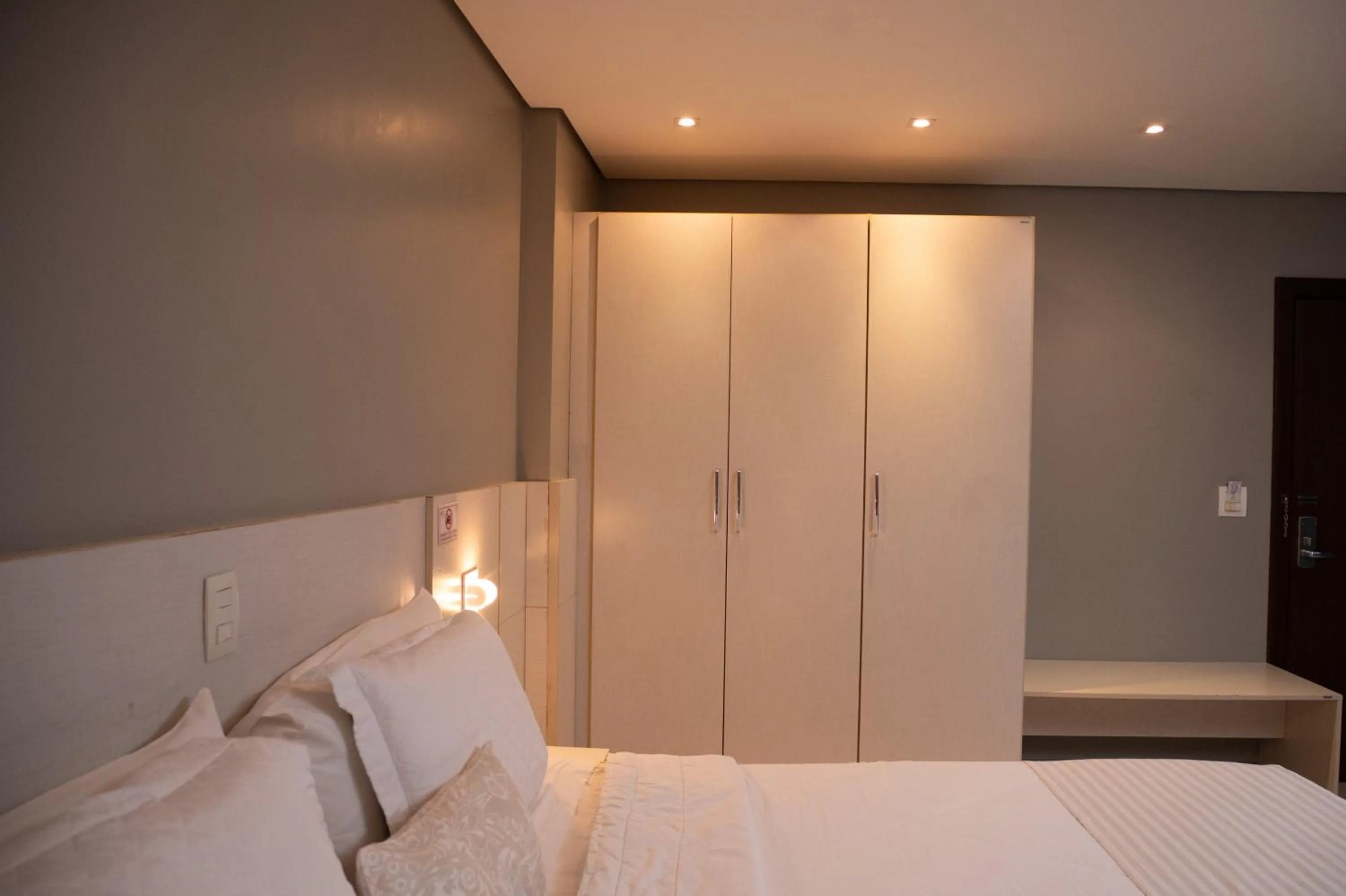 Bed in Golden Plaza Hotel