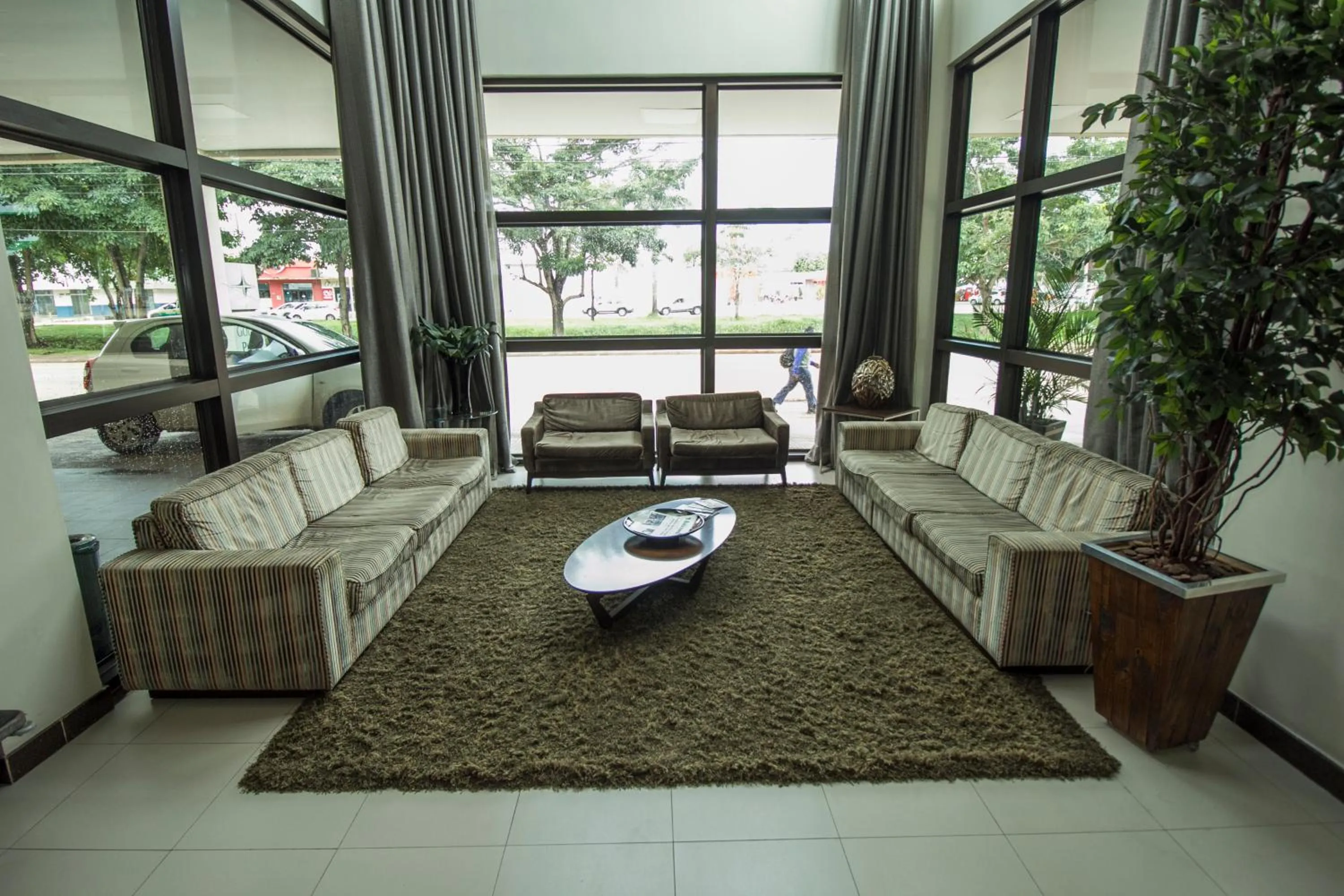 Communal lounge/ TV room in Golden Plaza Hotel