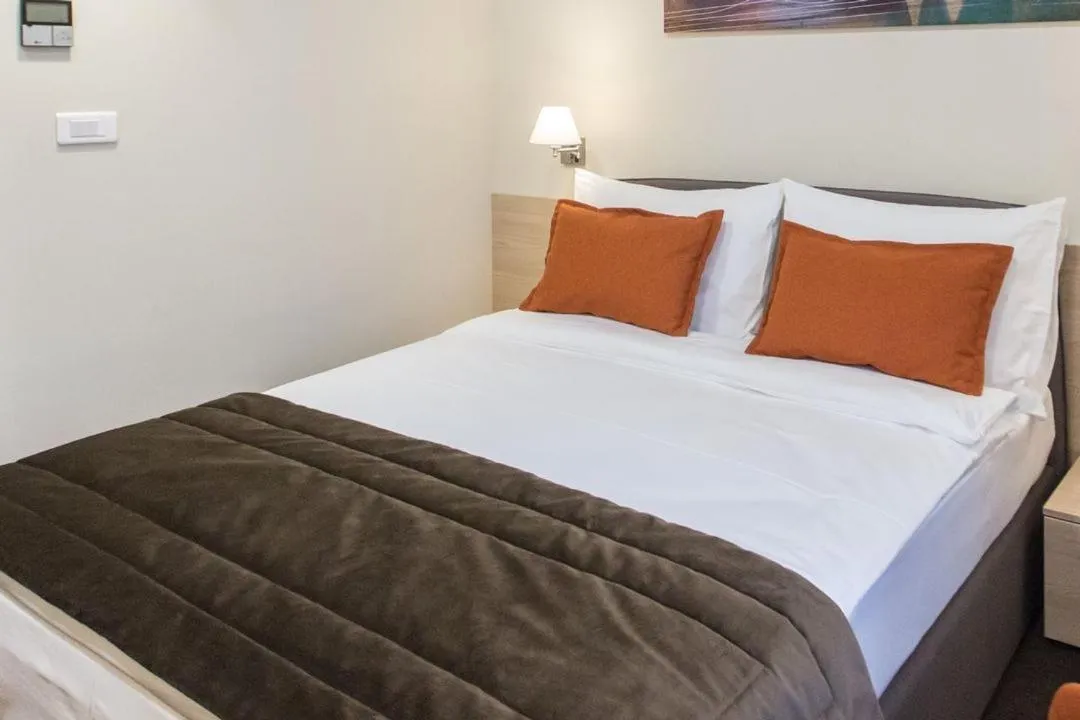 Bed in Hotel Grand Hedonist