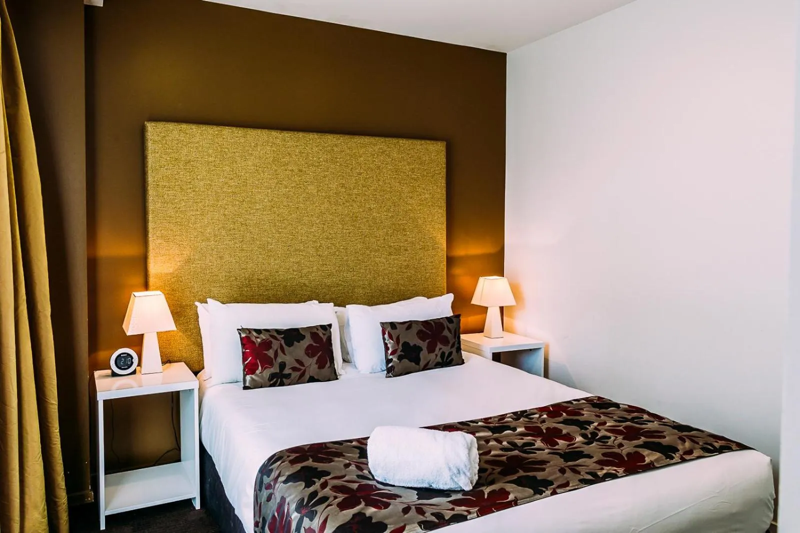 Bed in The Quadrant Hotel & Suites