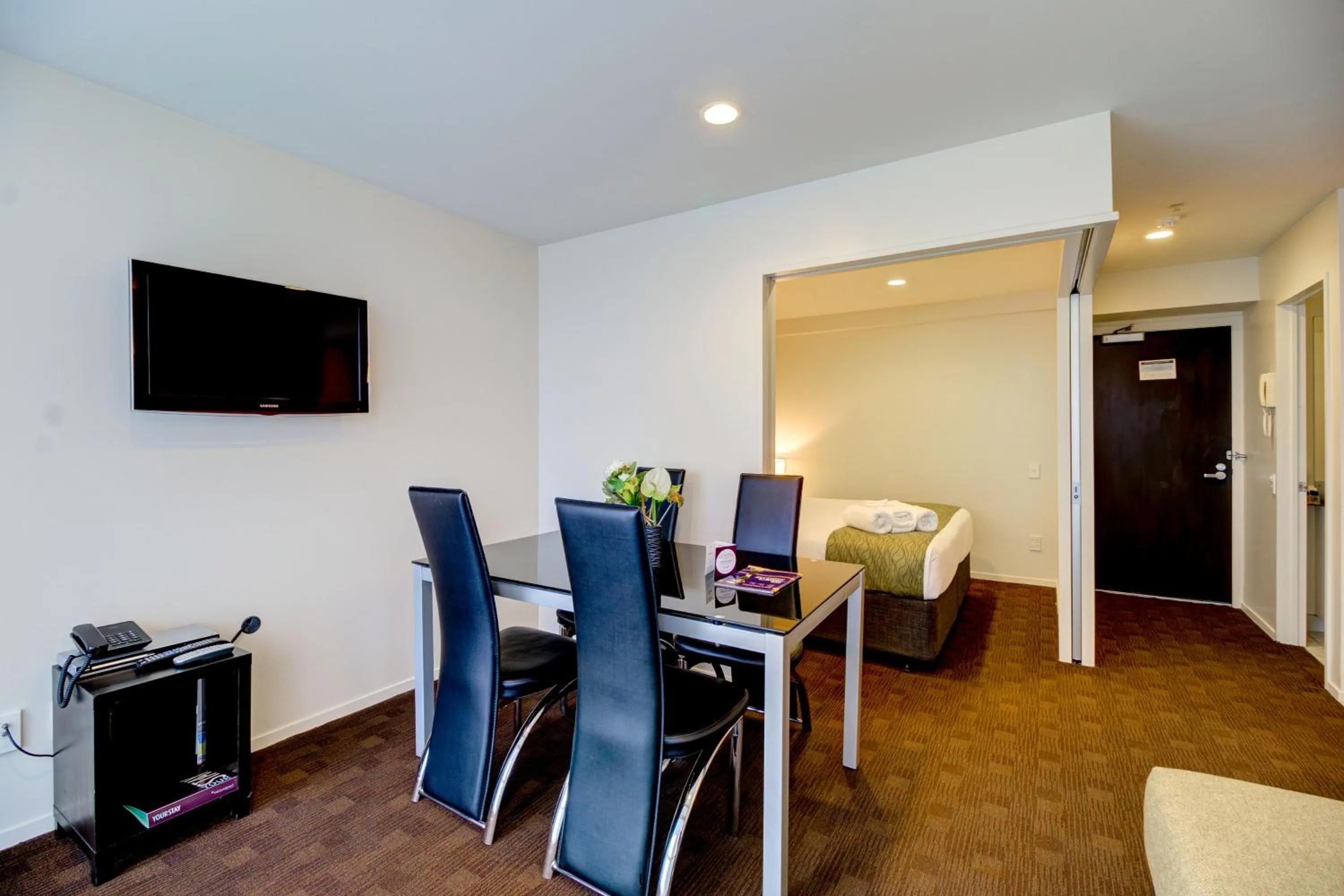 Communal lounge/ TV room in The Quadrant Hotel & Suites